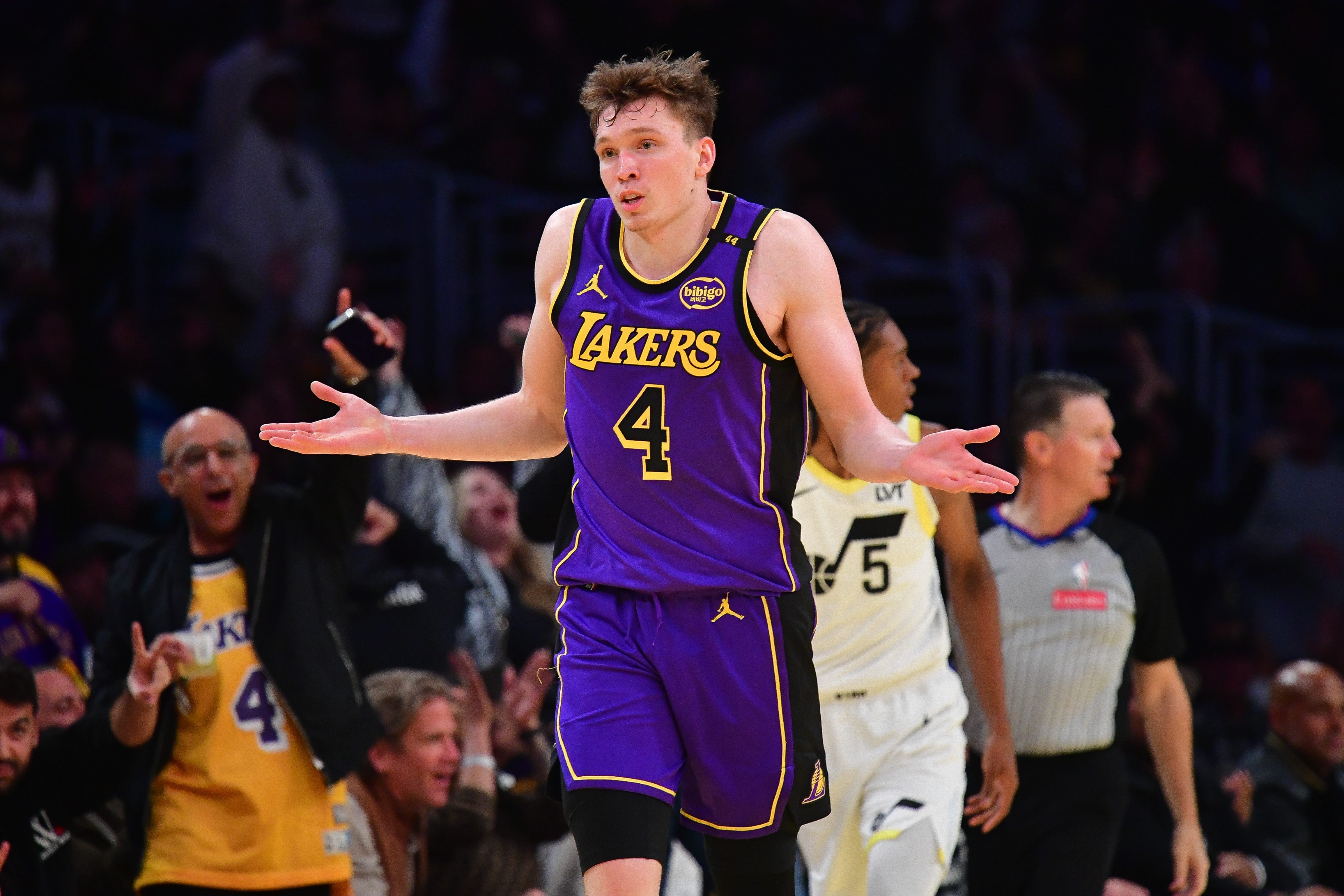 Lakers guard Dalton Knecht channels his inner Michael Jordan after hitting one of his nine 3-pointers Tuesday against the Utah Jazz.