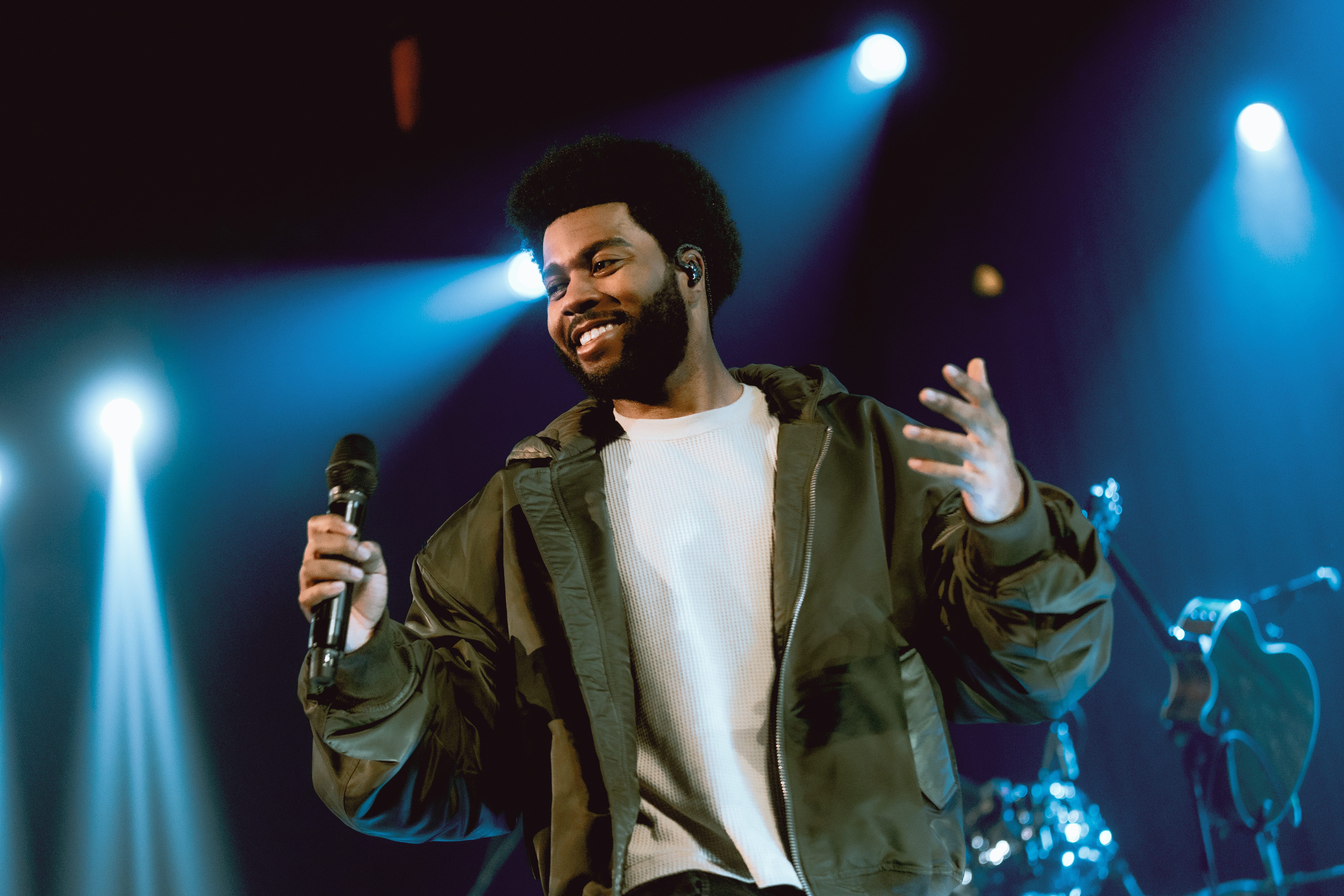 Khalid speaks with iHeartRadio personality Gabby Diaz at the iHeartRadio LA Theater in Burbank, California, on Nov. 25, 2024. Khalid's performance will be broadcast select stations on Dec. 19 as well as Fortnite's State Farm Park in iHeartLand, which will also include an interview and an 
