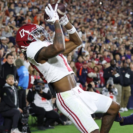 Alabama wide receiver Isaiah Bond (17) scores the game-winning touchdown against Auburn during their 2023 game at Jordan-Hare Stadium.