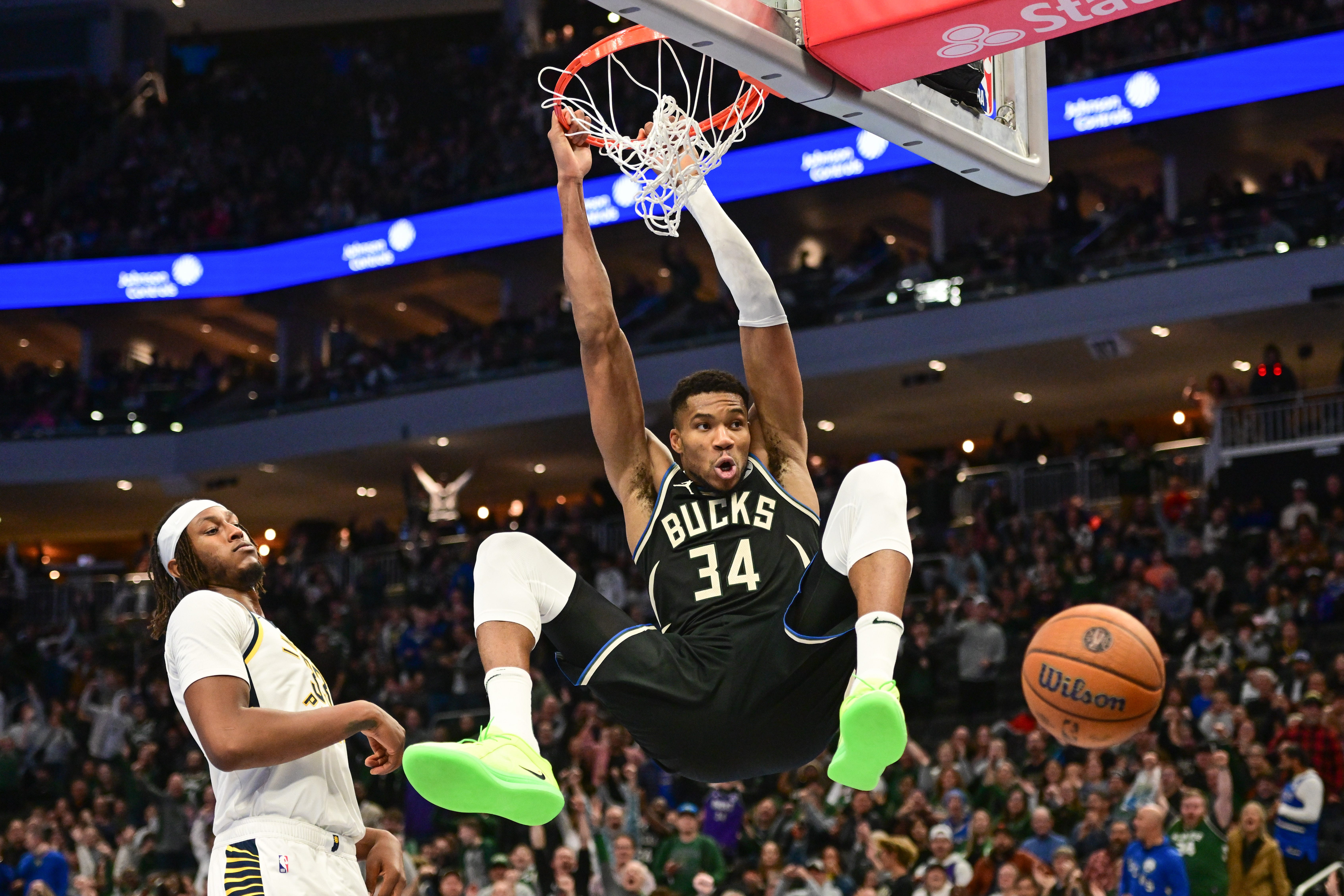Milwaukee Bucks forward Giannis Antetokounmpo (34) dunks against Indiana Pacers center Myles Turner (33)) at Fiserv Forum on Nov. 22, 2024.