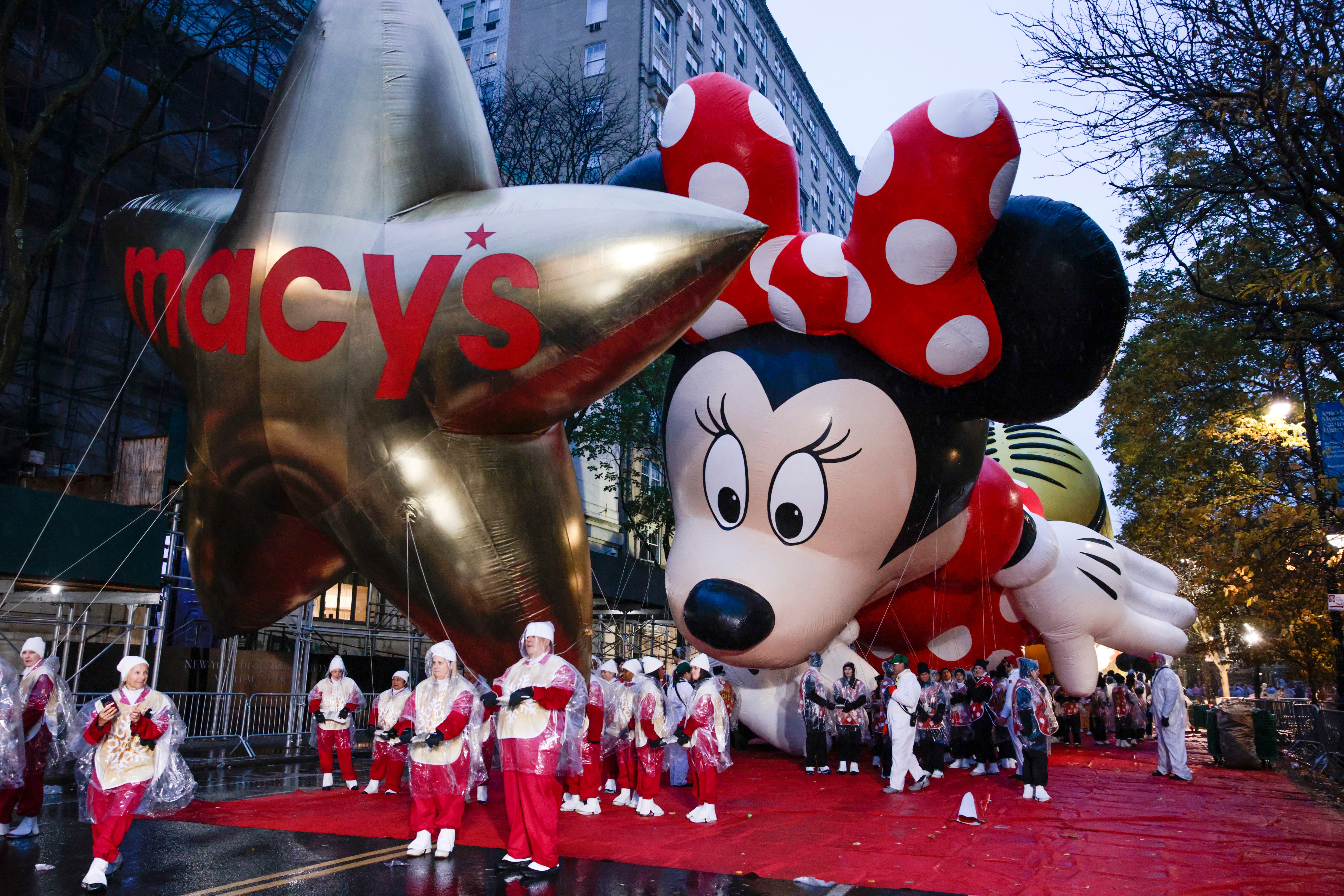Revelers gather as rain falls before the annual Macy's Thanksgiving Day Parade on Nov. 28, 2024, in New York City.