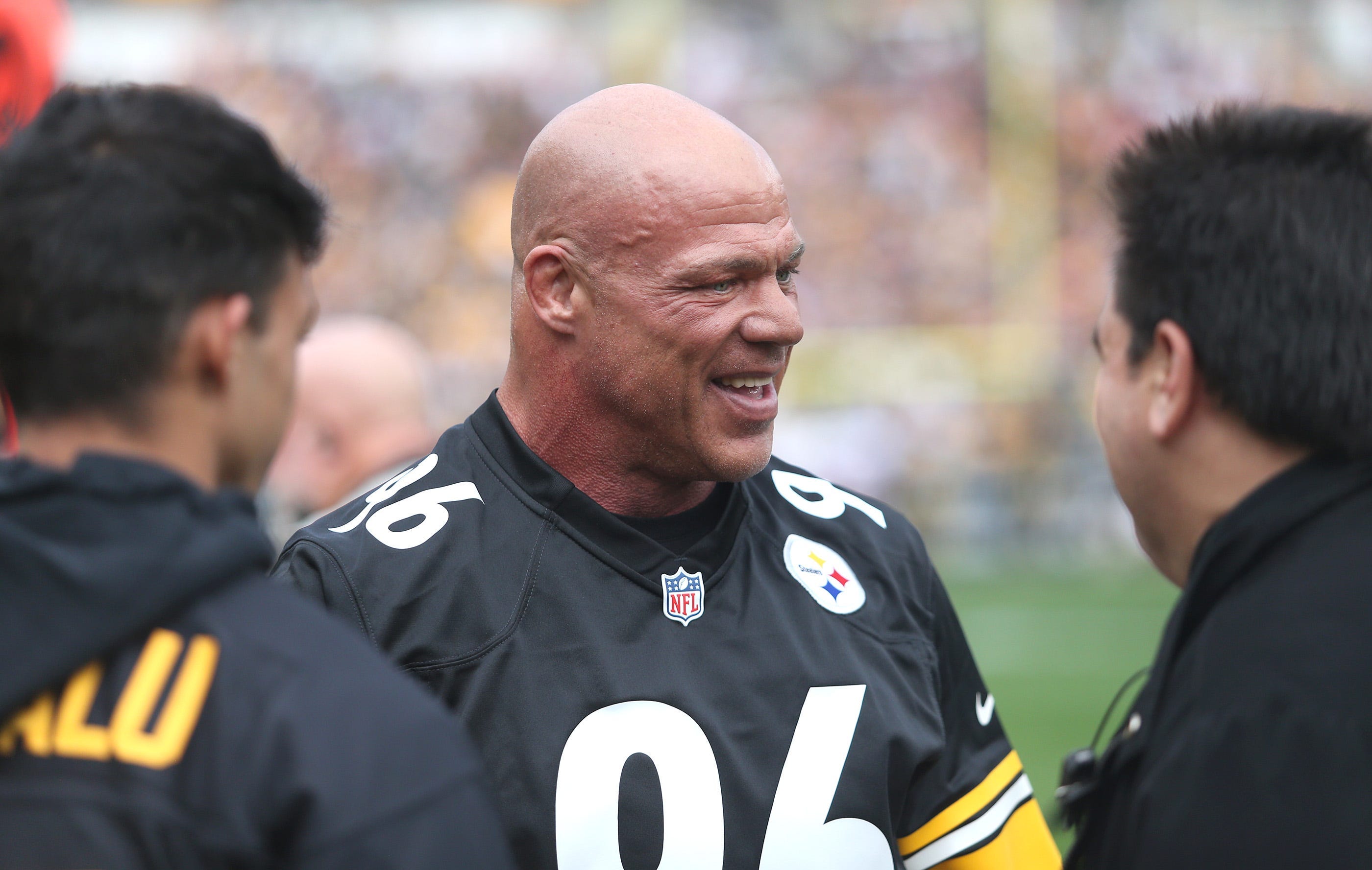 Pittsburgh native Kurt Angle walks on the sidelines prior to the start of the Pittsburgh Steelers and Tampa Bay Buccaneers game at Acrisure Stadium in Pittsburgh, PA on October 16, 2022.
