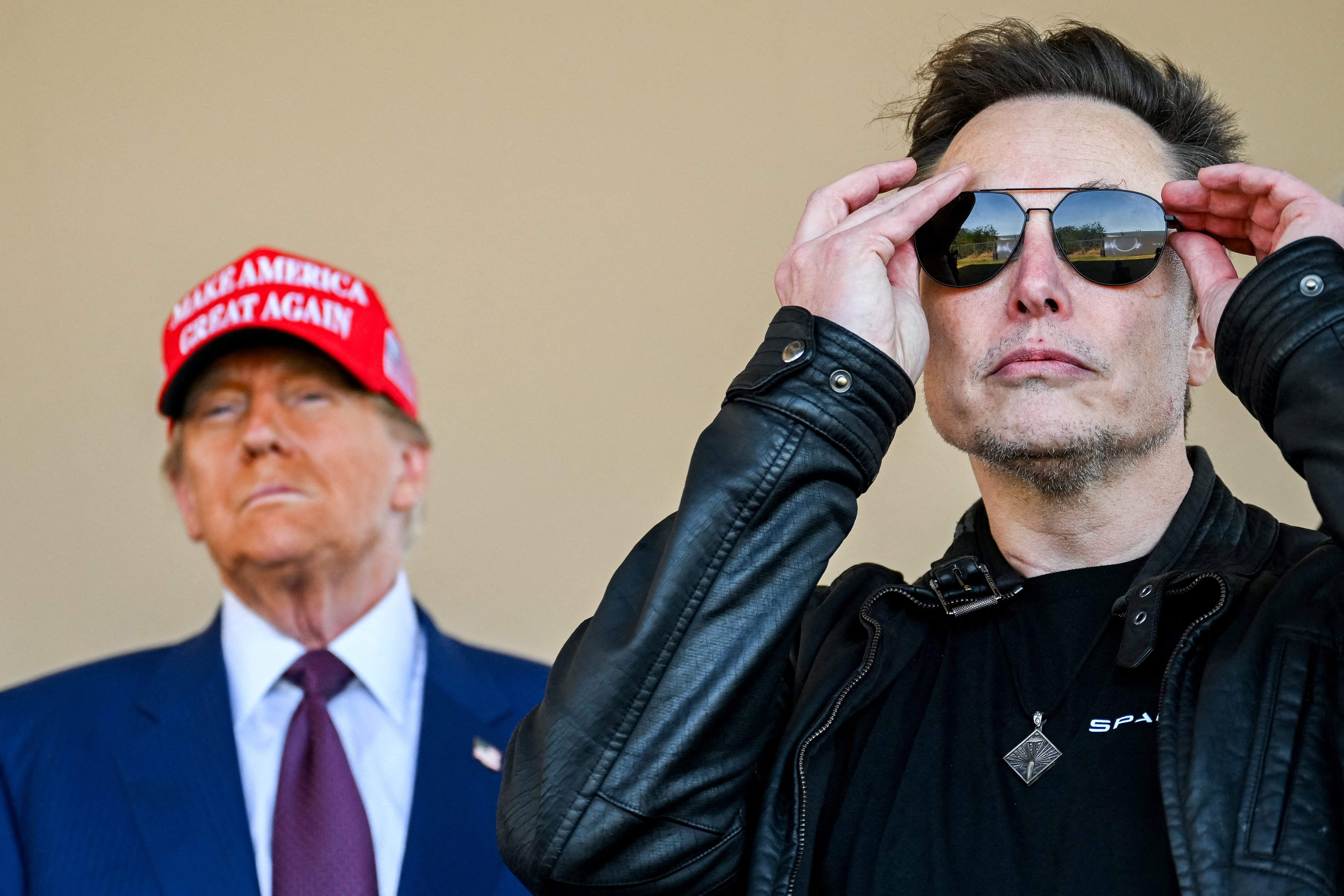 President-elect Donald Trump and SpaceX CEO Elon Musk watch the launch of a test rocket in Brownsville, Texas, on Nov. 19, 2024.