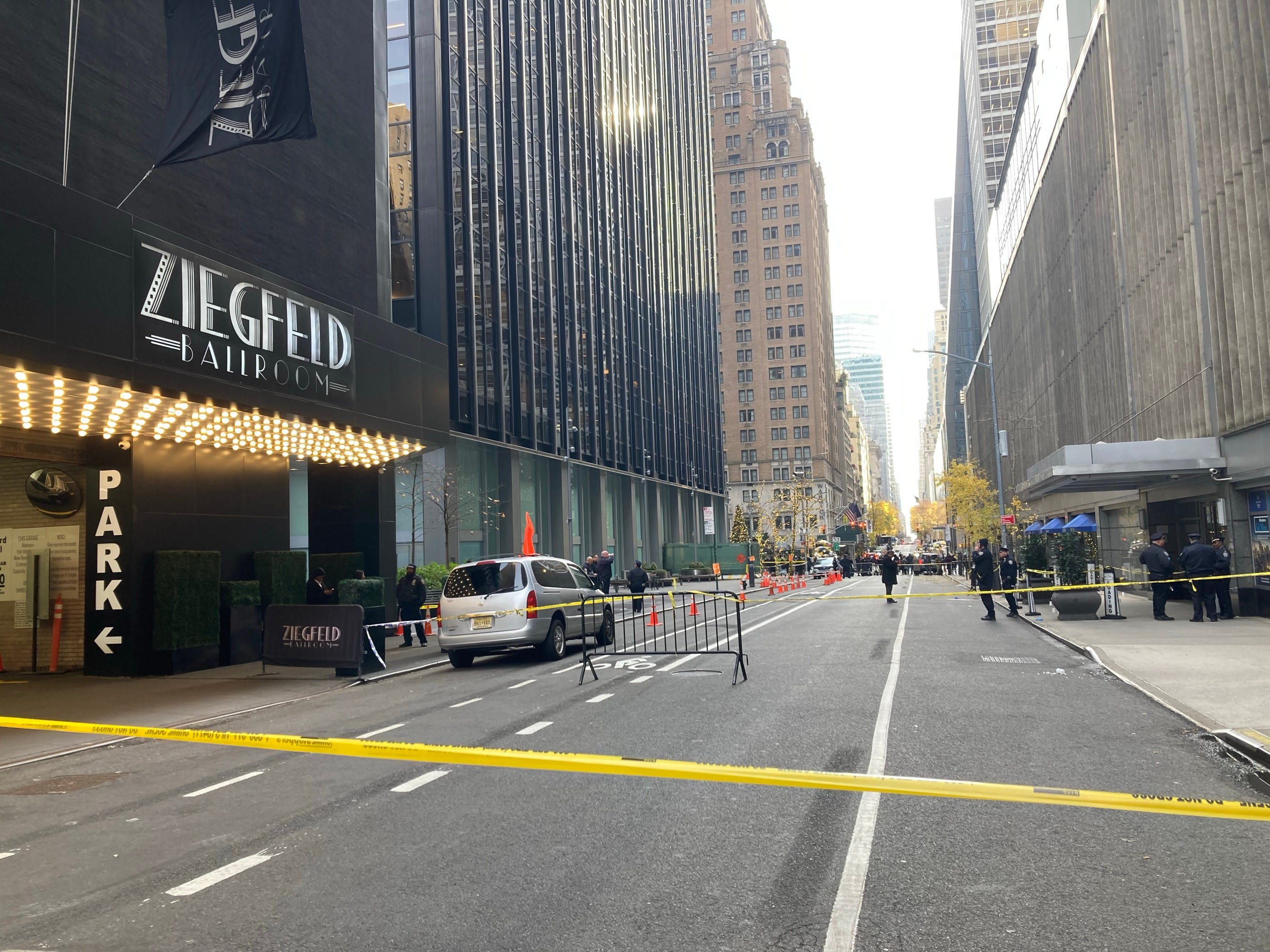 A gunman, who was wearing a mask, opened fire at 6:45 a.m. outside a Hilton in Midtown Manhattan on Dec. 4, 2024, before fleeing on foot, according to the NYPD.