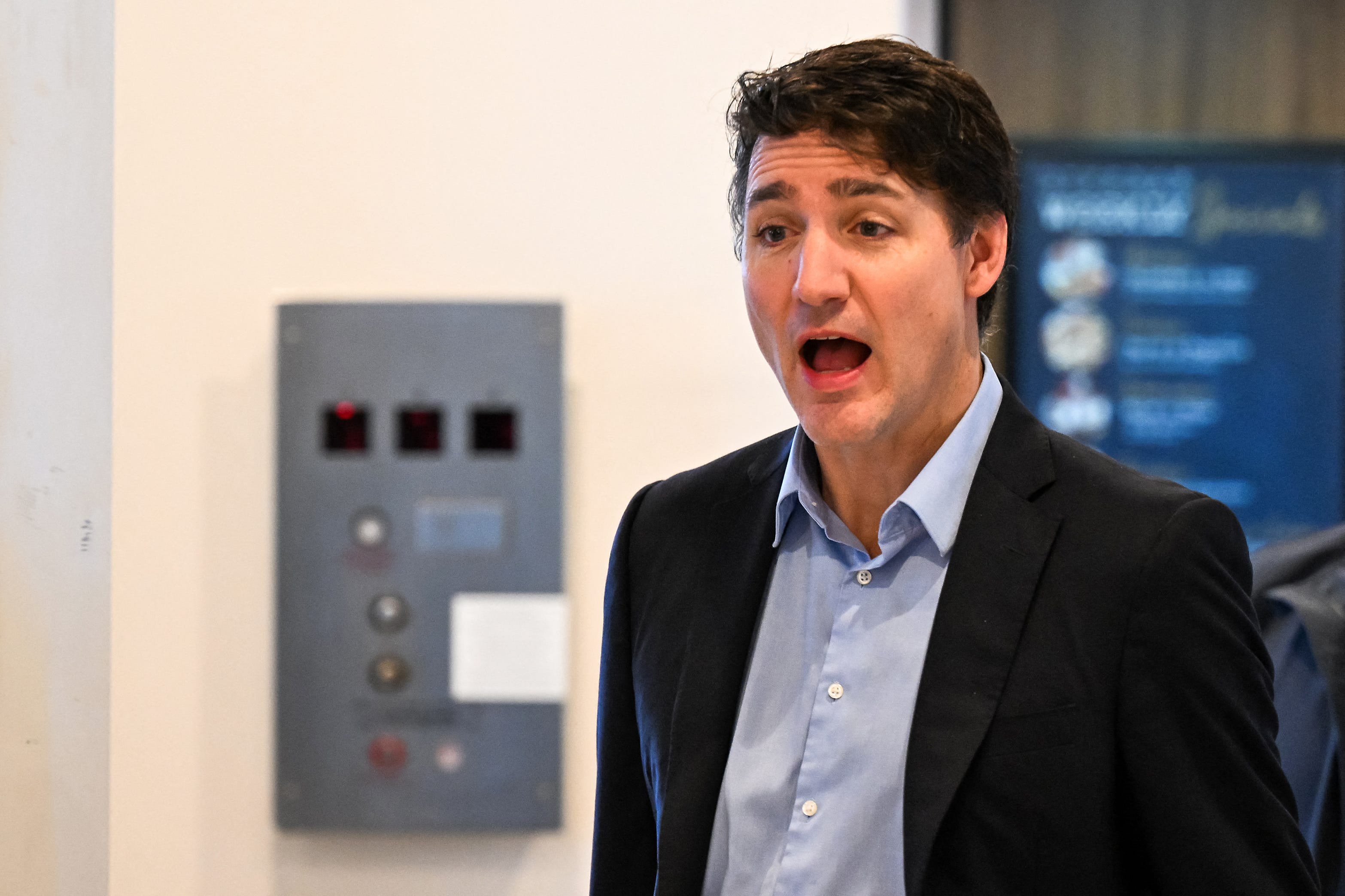 Canadian Prime Minister Justin Trudeau leaves the hotel for the airport, in West Palm Beach, Florida, on November 30, 2024. Canadian Prime Minister Justin Trudeau arrived in Florida on November 29 for a dinner with Donald Trump at the president-elect's Mar-a-Lago estate, as the incoming US leader promised tariffs on Canadian imports.  The unannounced meeting comes at the end of a week that has seen Canada as well as Mexico scramble to blunt the impact of Trump's trade threats, which experts have warned could also hit US consumers hard. (Photo by CHANDAN KHANNA / AFP) (Photo by CHANDAN KHANNA/AFP via Getty Images)