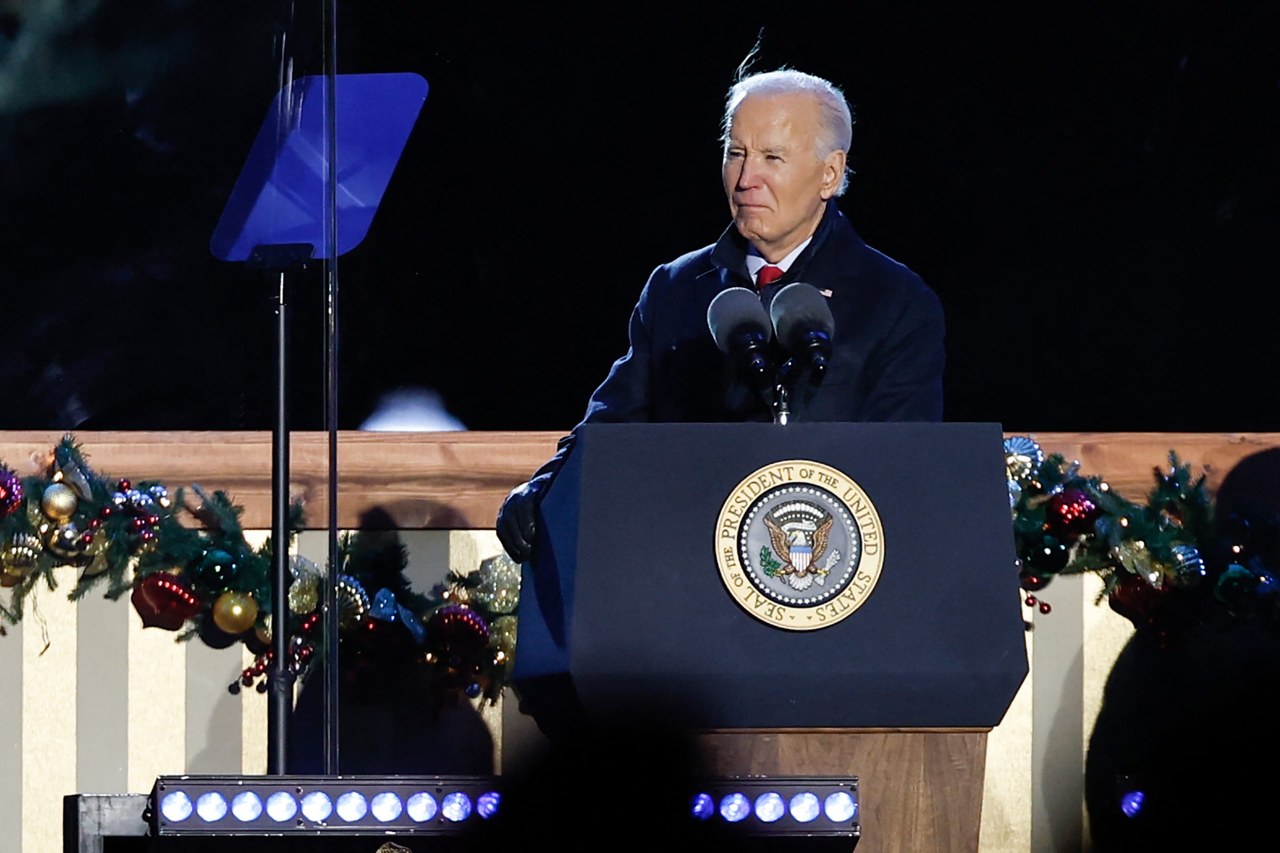 President Joe Biden addresses observers at the lighting of the National Christmas Tree outside the White House on Dec. 5, 2024.