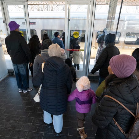 Passengers board a morning train to Grand Central from the White Plains Metro-North Railroad Station in White Plains on Saturday, December 7, 2024.
