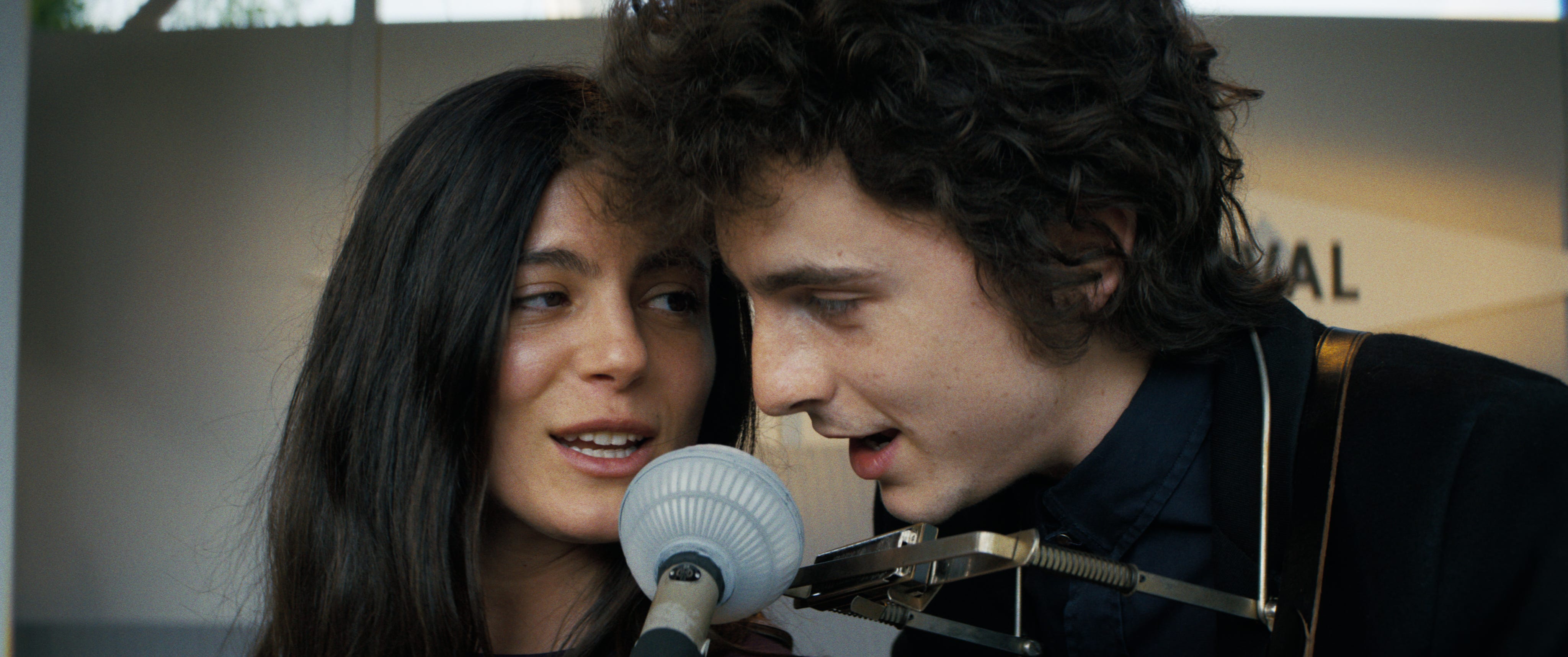 Joan Baez (Monica Barbaro) and Bob Dylan (Timothée Chalamet) have chemistry on and off stage in "A Complete Unknown."