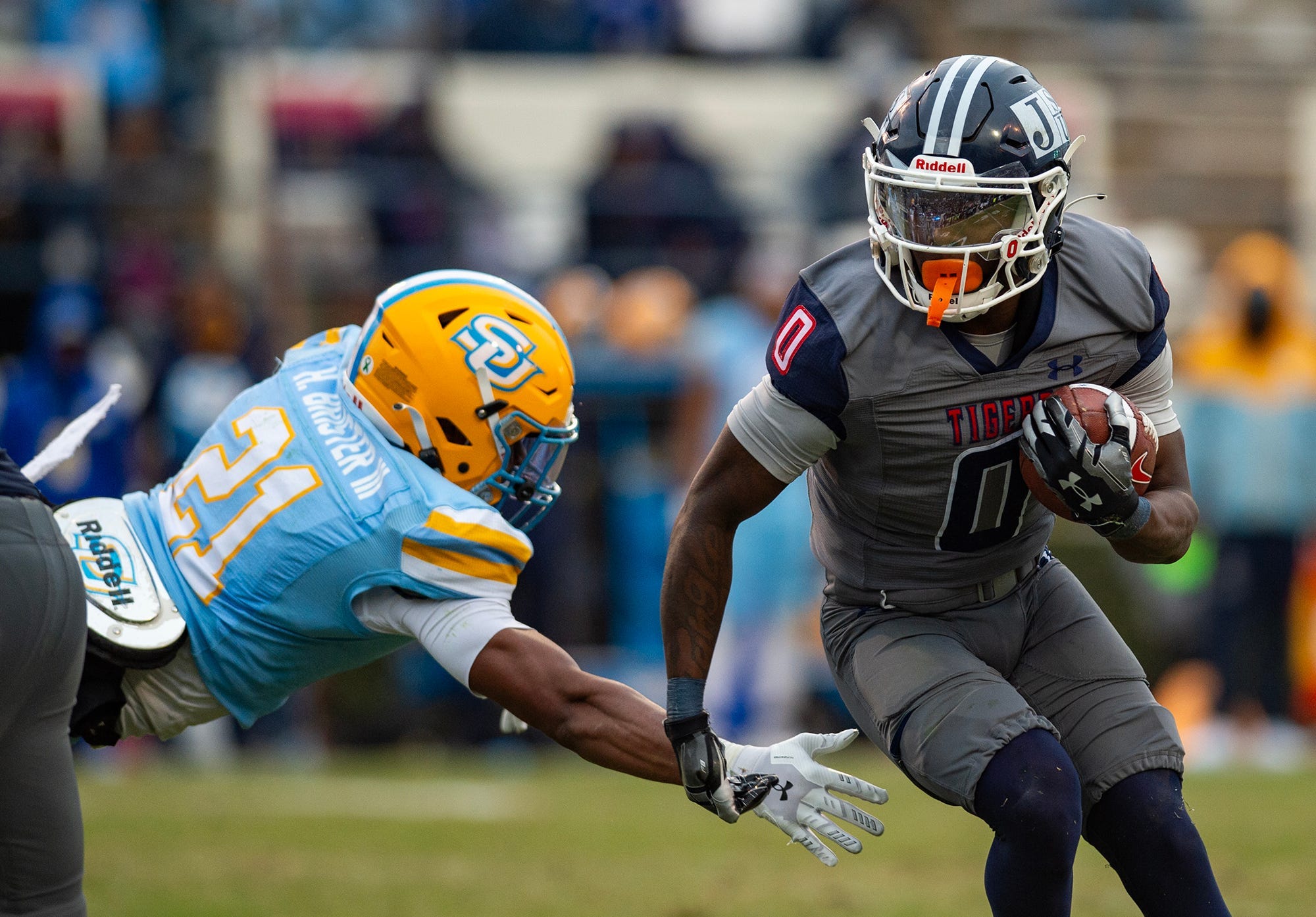 Jackson State Tigers' running back Travis Terrell Jr. runs the ball during the SWAC Championship game against the Southern Jaguars.