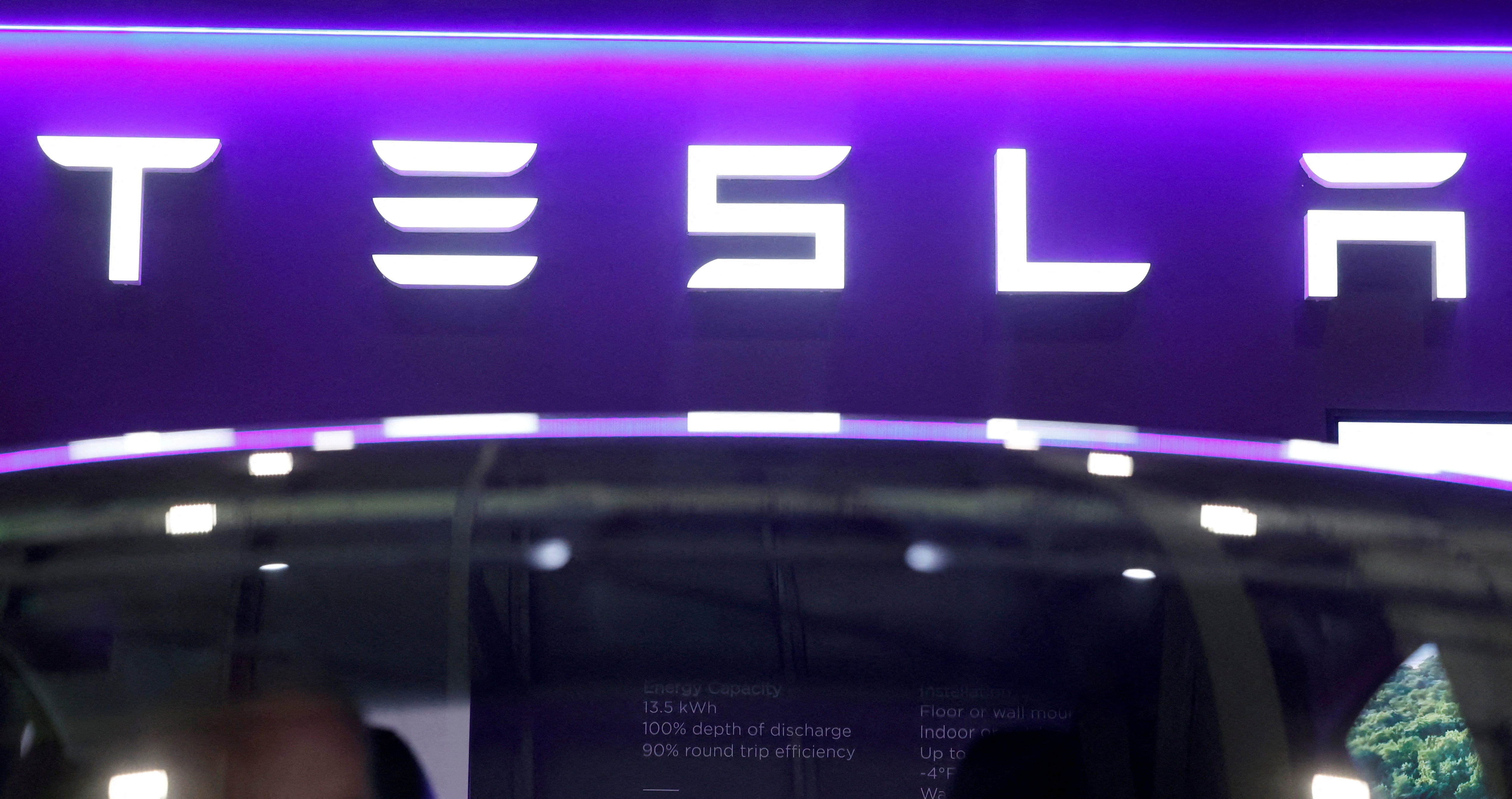 The logo of Tesla on display at the Everything Electric exhibition at the ExCeL London international exhibition and convention centre in London, Britain, March 28, 2024.
