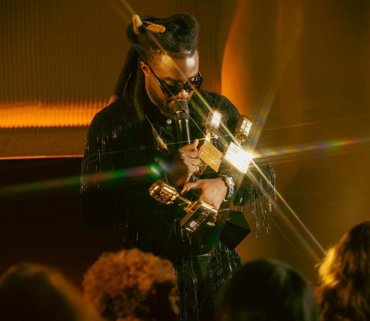 Shaboozey wins a trophy at for top-selling song at the 2024 Billboard Music Awards, which aired Dec. 12, 2024