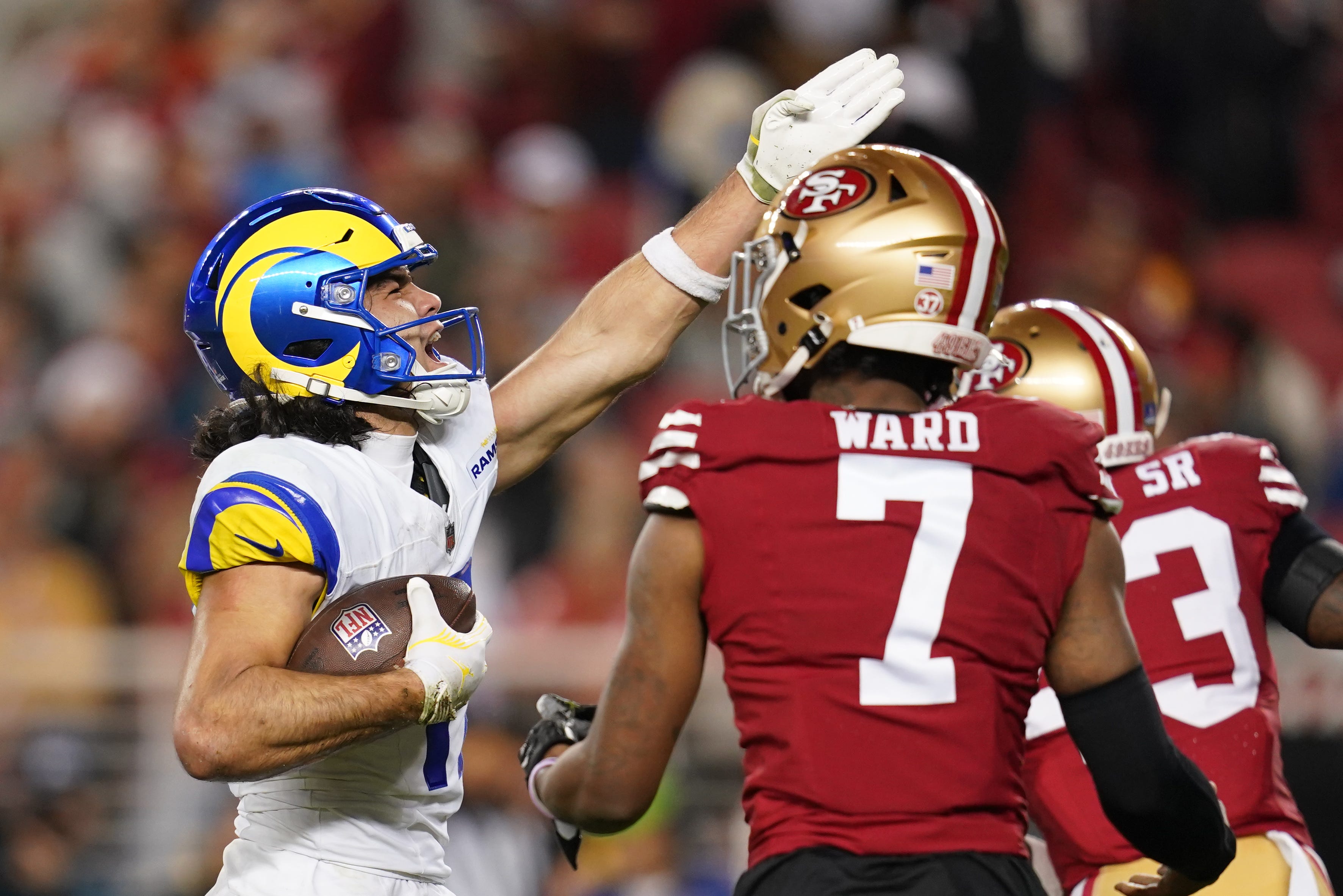Rams wide receiver Puka Nacua celebrates a first down against the 49ers.