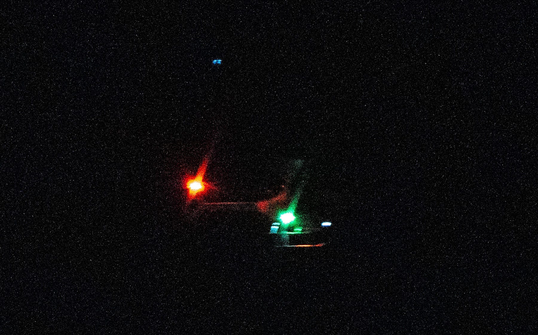 Photos taken in the bayside section of Toms River, NJ of what appear to be large drones hovering in the area at high altitudes sometime between 8:33 p.m. and 8:49 p.m. on Dec. 8, 2024.