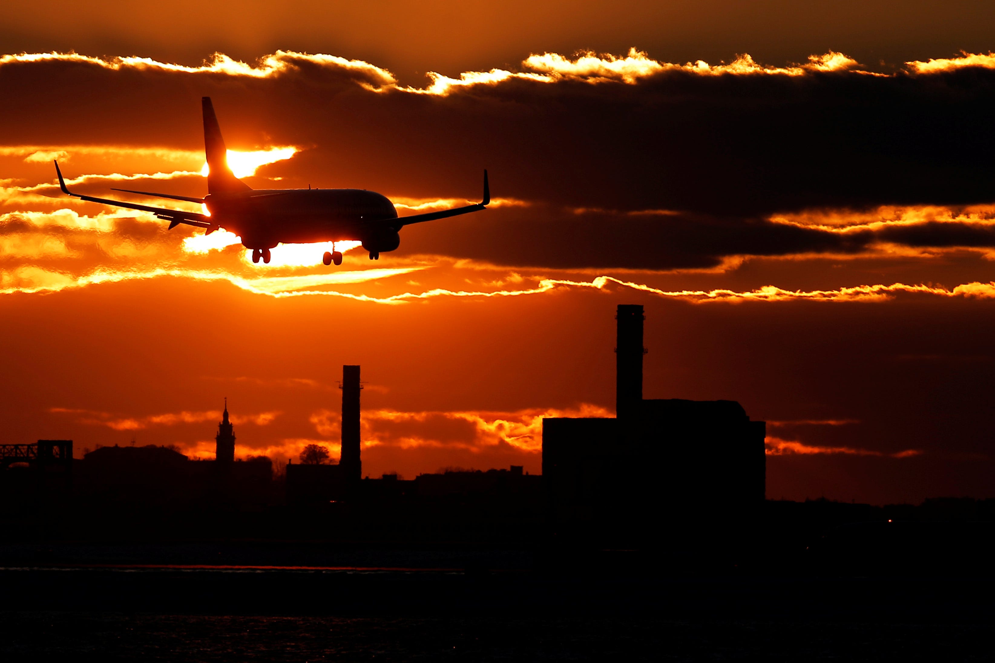 An American Airlines flight lands at Logan International Airport in Boston, Massachusetts, U.S. January 9, 2018.