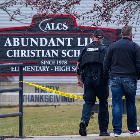 Law enforcement officers at the scene of a shooting on Dec. 16, 2024, at the Abundant Life Christian School in Madison, Wis.