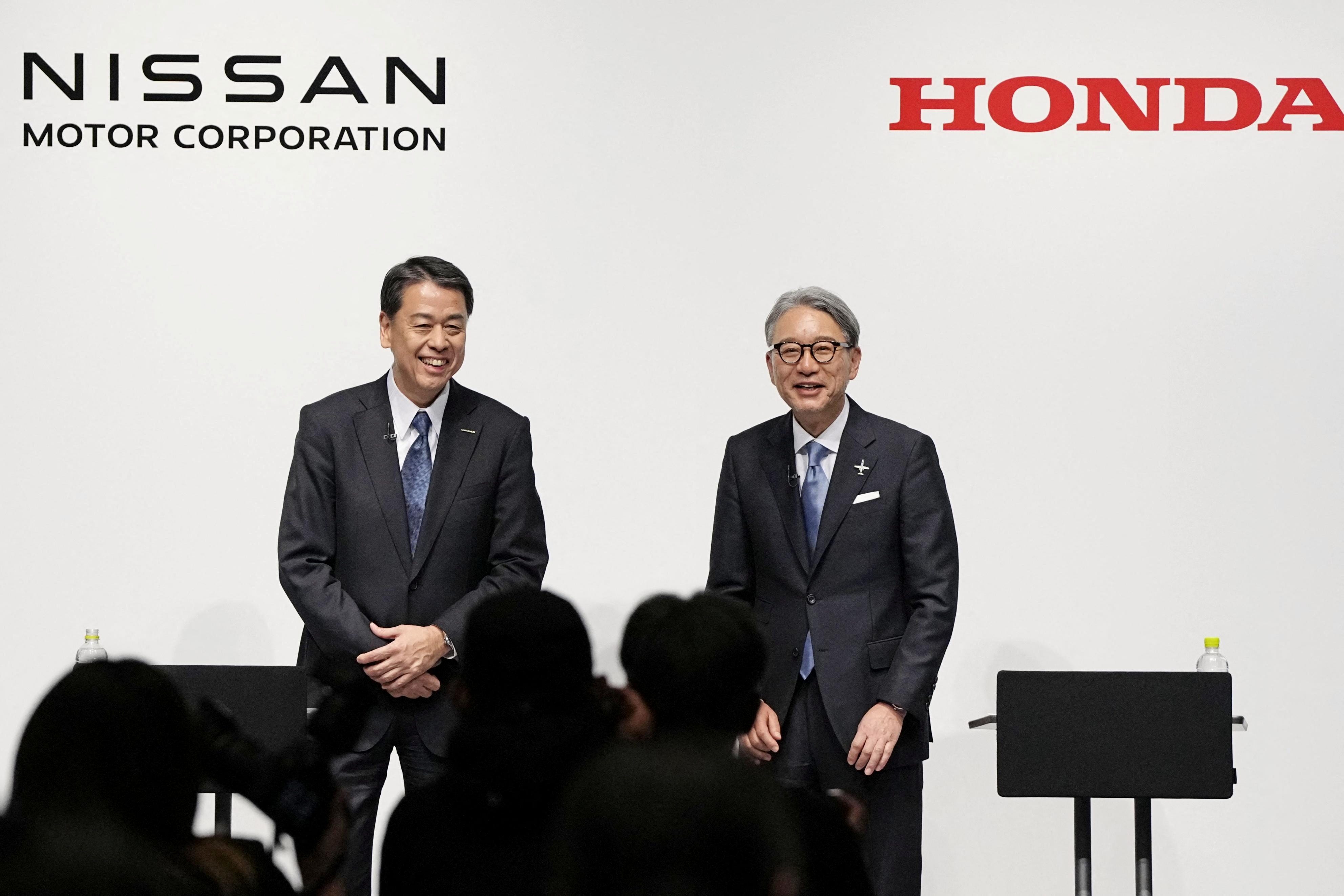 Makoto Uchida, president and CEO of Nissan Motor, and Toshihiro Mibe, Honda Motor president and CEO, attend their joint press conference in Tokyo, Japan March 15, 2024.