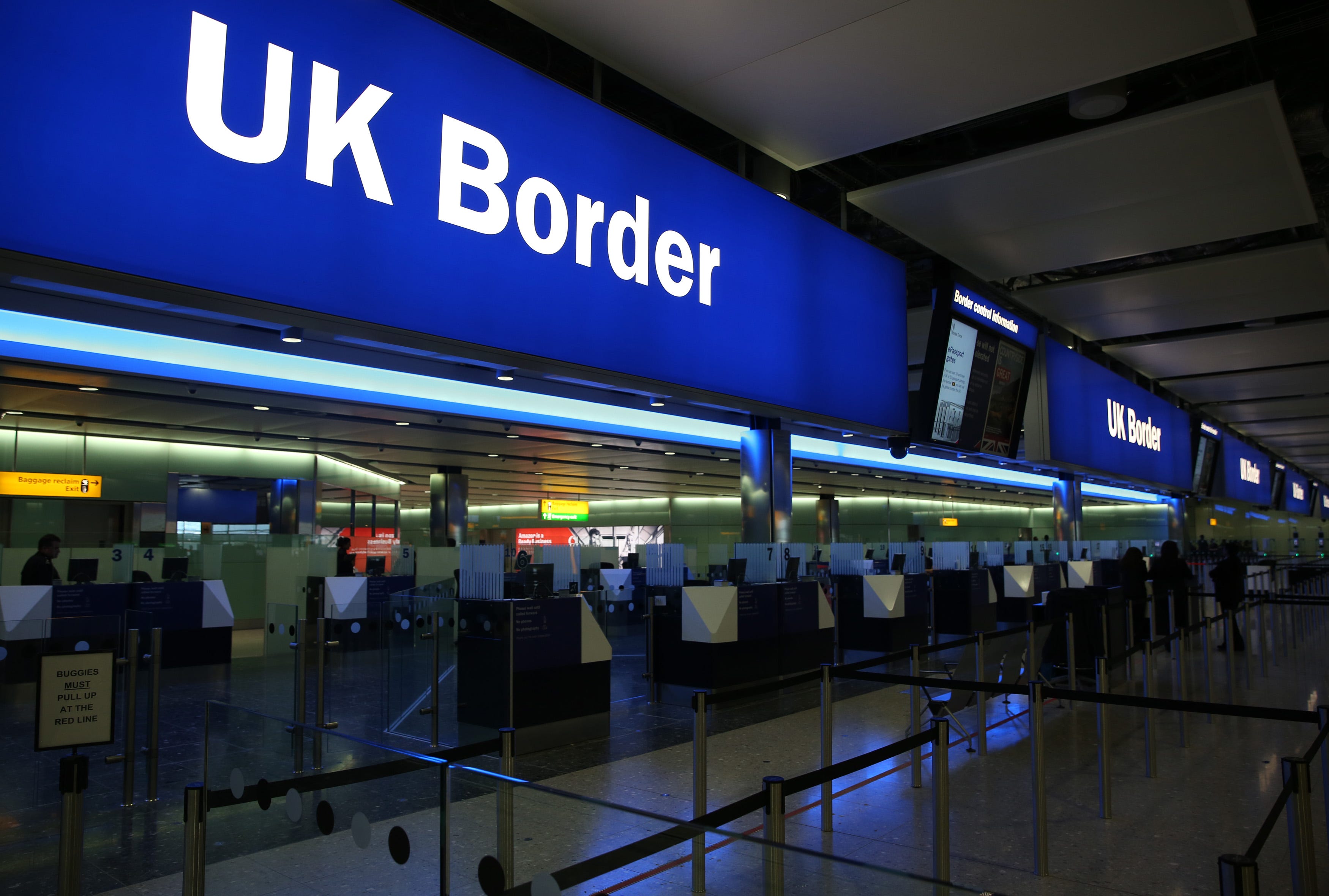 UK Border control is seen in Terminal 2 at Heathrow Airport in London June 4, 2014.