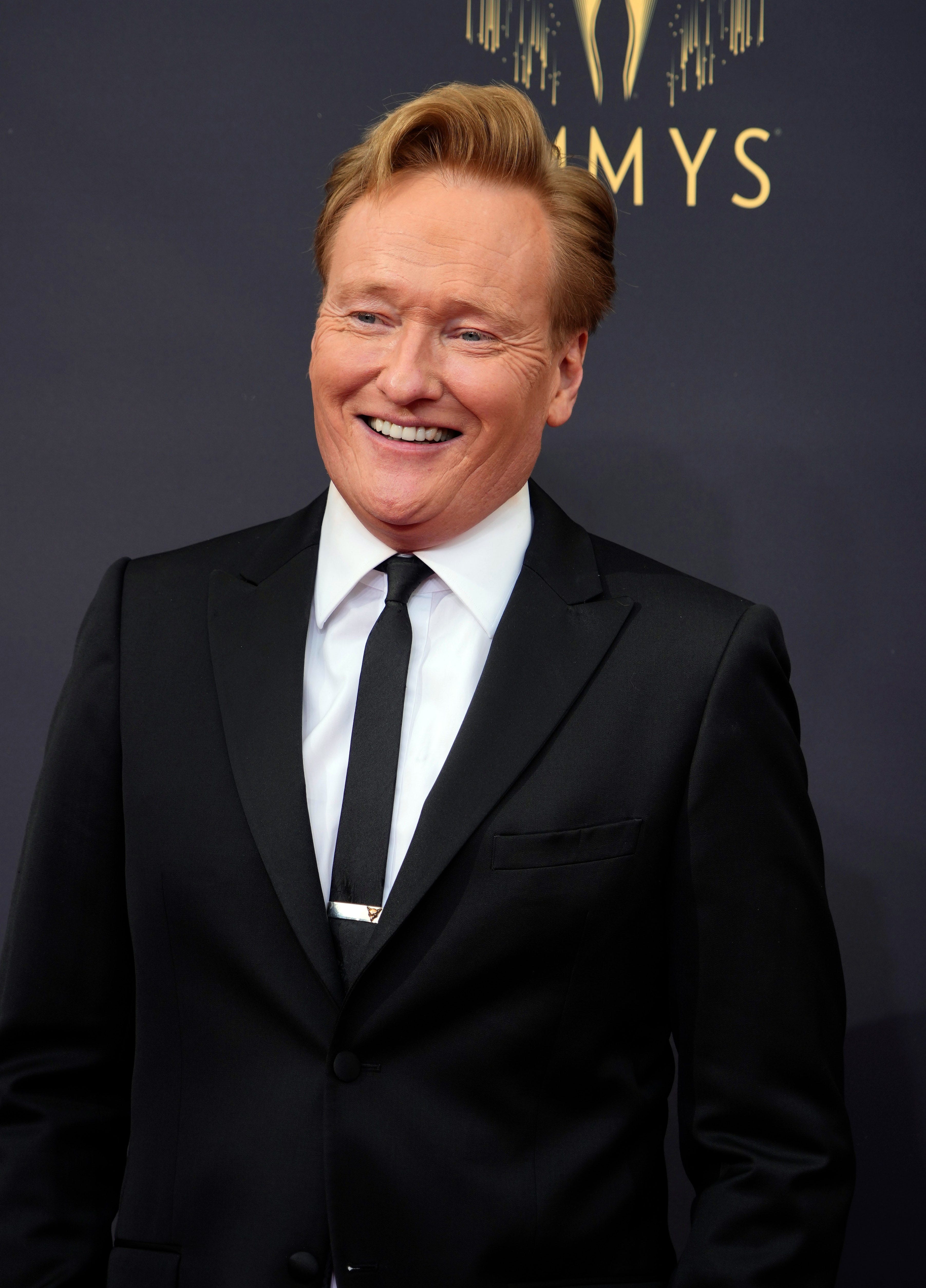 Sep 19, 2021; Los Angeles, CA, USA; Conan O'Brien arrives at the 73rd Emmy Awards at L.A. Live. Mandatory Credit: Robert Hanashiro-USA TODAY