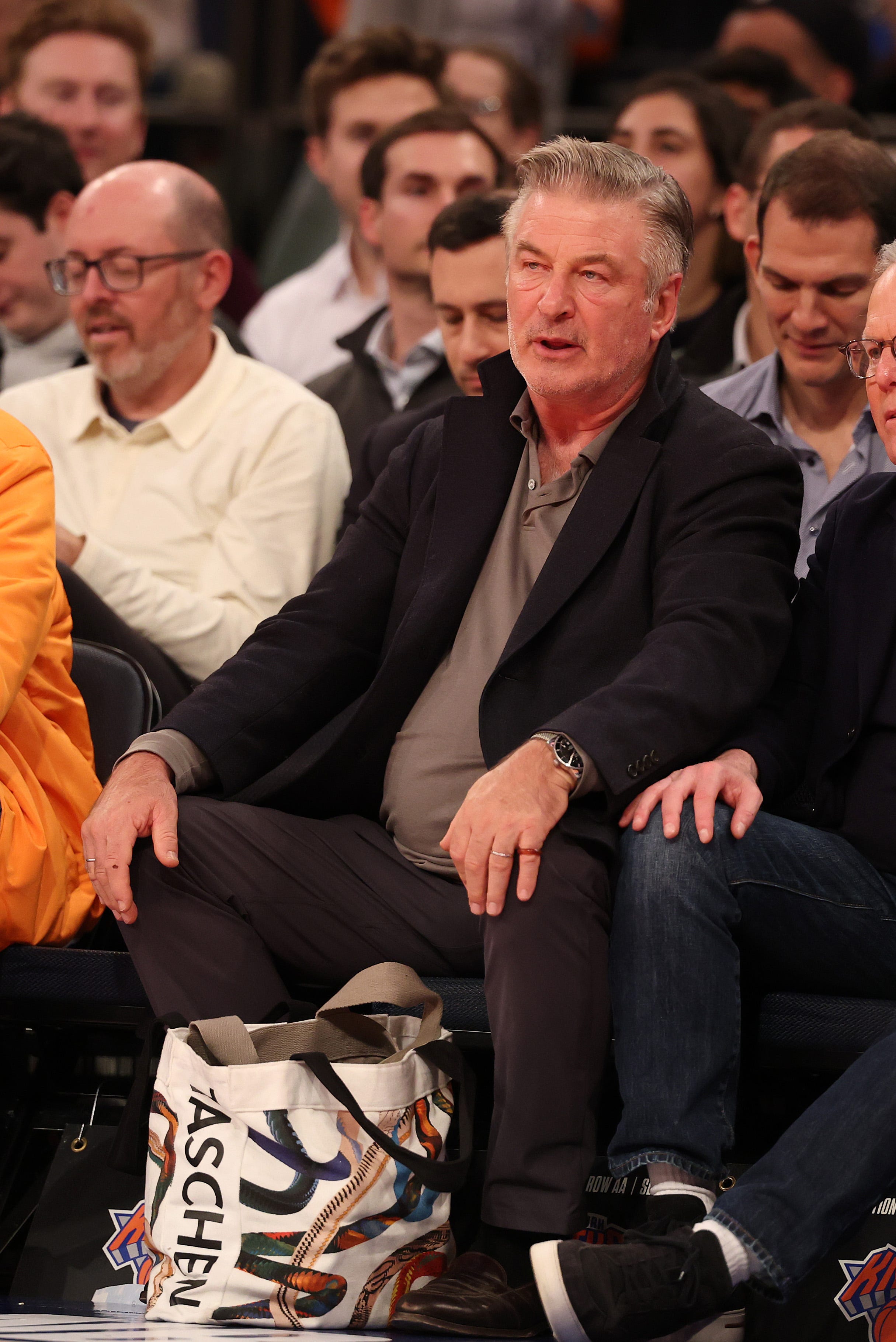 NEW YORK, NEW YORK - DECEMBER 03: Alec Baldwin looks onduring the game between the New York Knicks and the Orlando Magic at Madison Square Garden on December 03, 2024 in New York City. User expressly acknowledges and agrees that, by downloading and or using this photograph, User is consenting to the terms and conditions of the Getty Images License Agreement. (Photo by Al Bello/Getty Images)