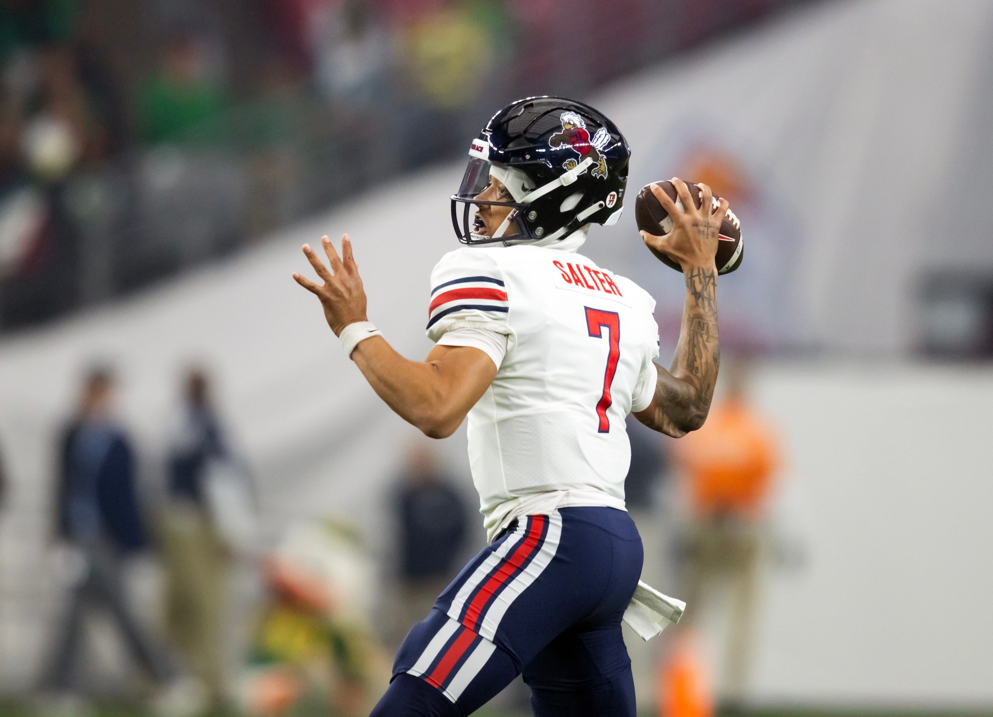 Liberty quarterback Kaidon Salter (7) sets to throw against Oregon during the 2024 Fiesta Bowl at State Farm Stadium in Glendale, Arizona on Jan. 1, 2024.