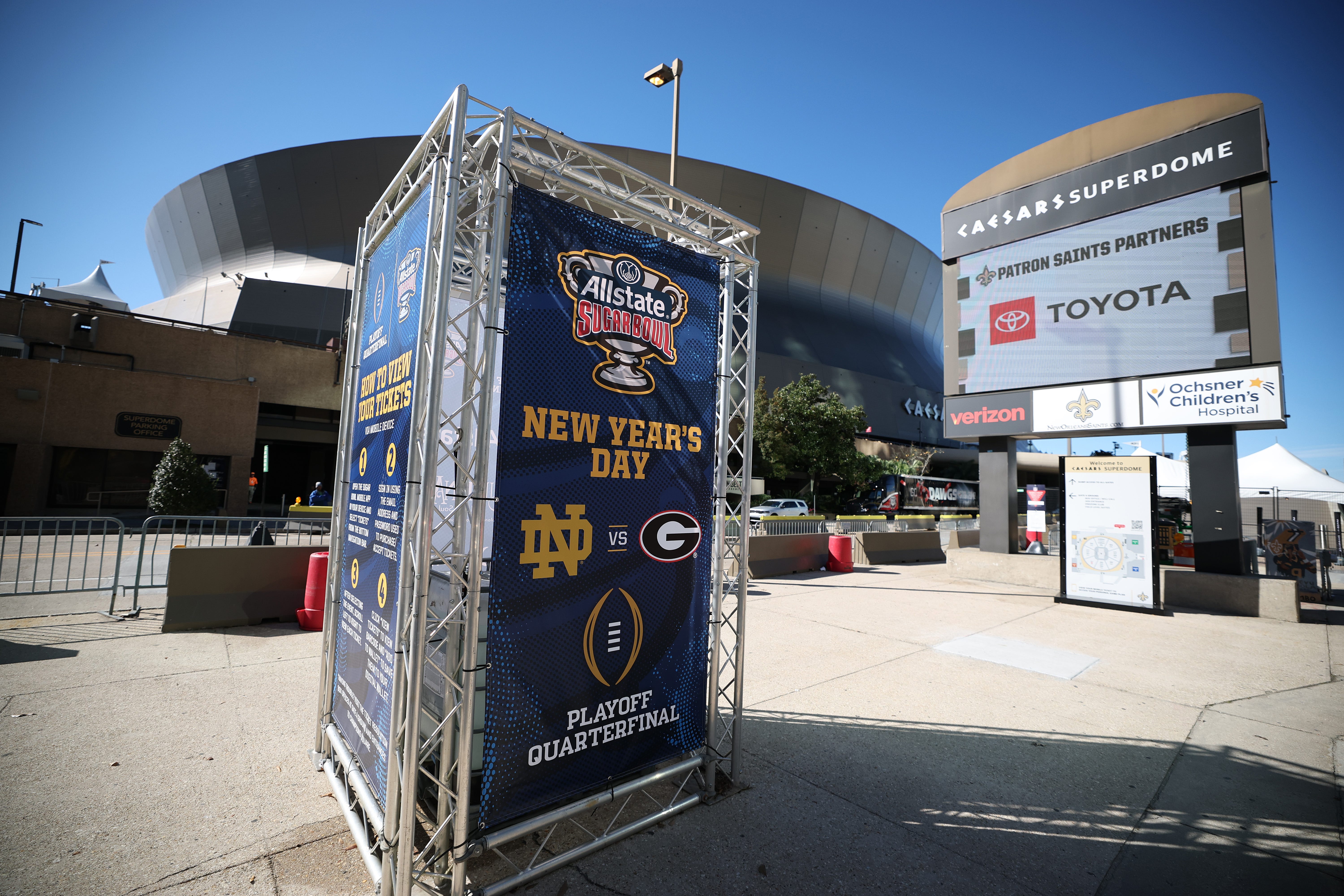 NEW ORLEANS, LOUISIANA - JANUARY 01: A sign for the Allstate Sugar Bowl between Georgia and Notre Dame is seen outside the Louisiana Superdome after at least ten people were killed on Bourbon Street when a person allegedly drove into a crowd in the early morning hours of New Year's Day on January 1, 2025 in New Orleans, Louisiana. Dozens more were injured after a suspect in a rented pickup truck allegedly drove around barricades and through a crowd of New Year's   revelers on Bourbon Street. The suspect then got out of the car, opened fire on police officers, and was subsequently killed by law enforcement. (Photo by Chris Graythen/Getty Images)