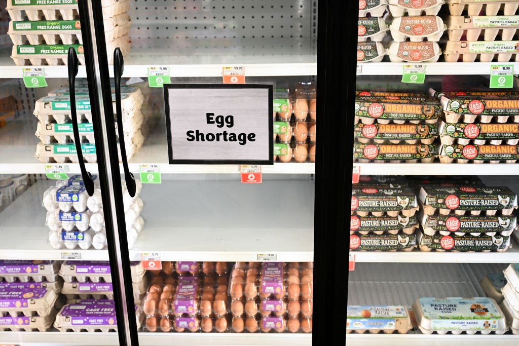 Egg shortage signage is displayed on partially empty shelves at a Sprouts Farmer's Market grocery store in Lawndale, California on January 2, 2025. Bird flu and other factors have contributed to an egg shortage in California.