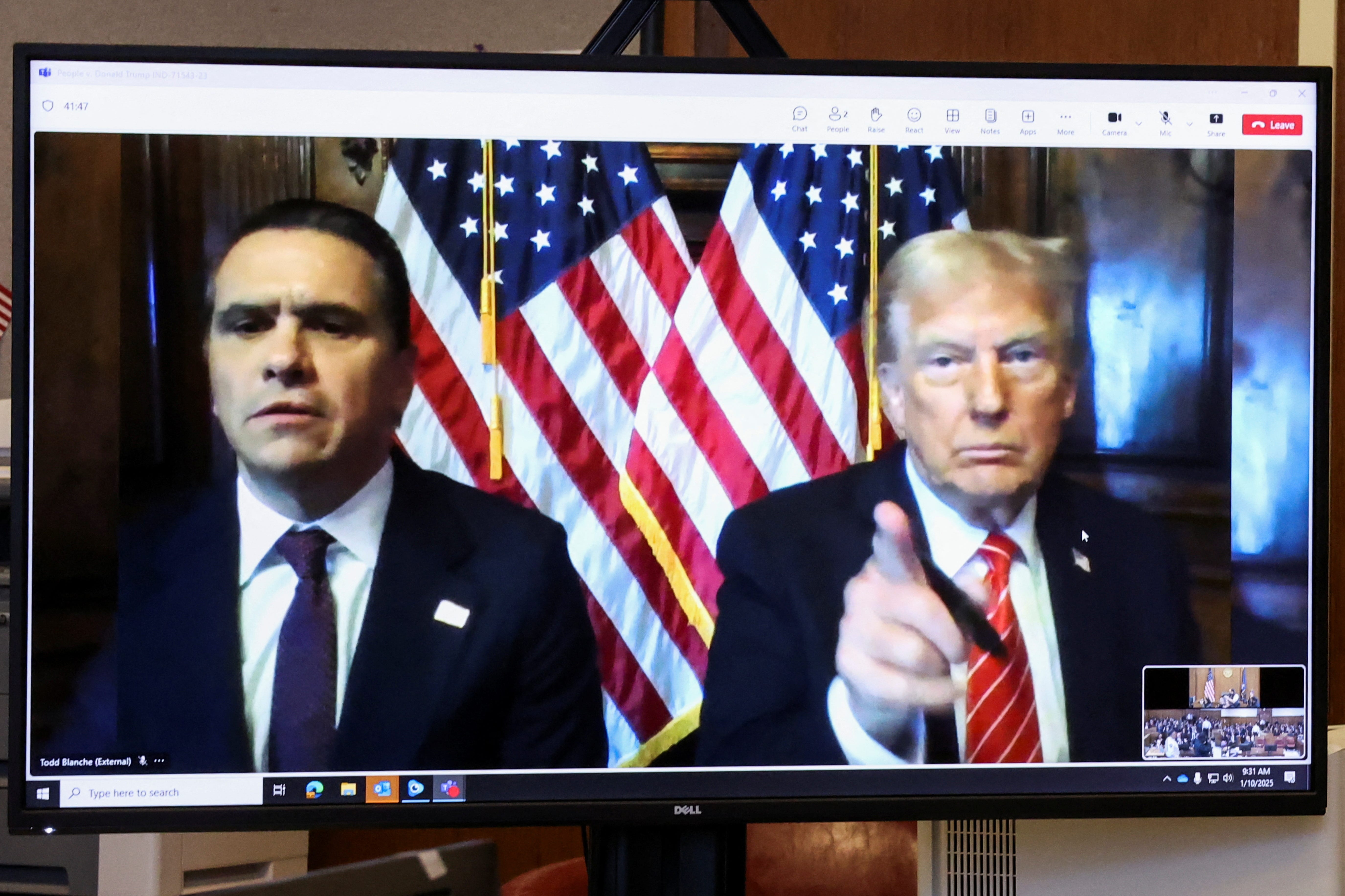 U.S. President-elect Donald Trump appears remotely for a sentencing hearing in front of New York State Judge Juan Merchan in the criminal case in which he was convicted in 2024 on charges involving hush money paid to a porn star, at New York Criminal Court in Manhattan in New York City, U.S., January 10, 2025.