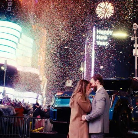 When the ball dropped, so did his knee for this magical proposal