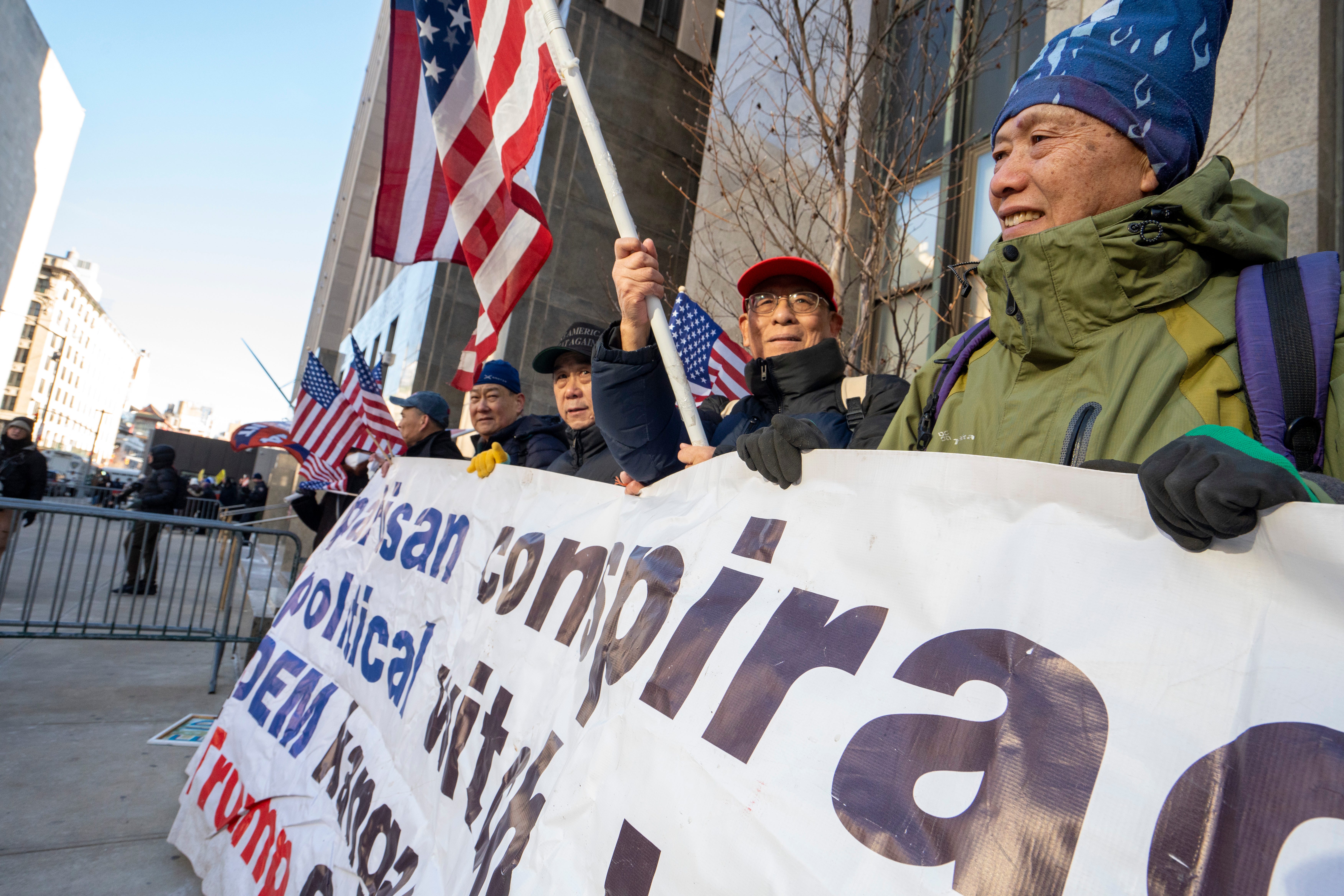 President-elect Donald Trump's supporters gather outside the court as Trump appears remotely before a judge for a sentencing hearing at Manhattan Criminal Courthouse in New York City on Friday, Jan. 10, 2025.