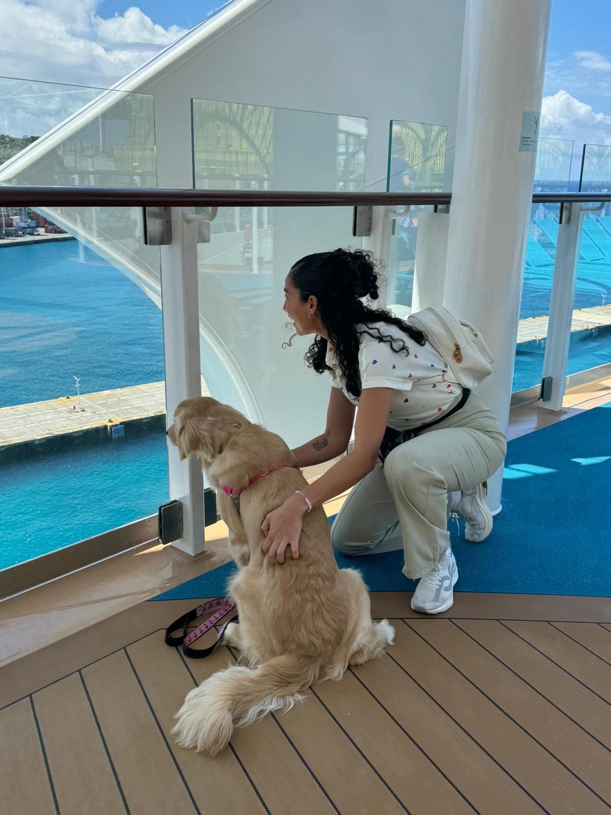 Rover and Trindade's responsibilities include greeting guests and crew on Icon of the Seas.