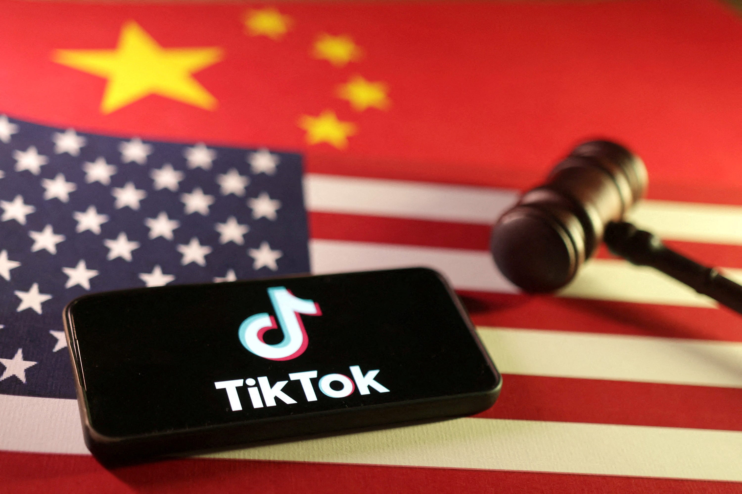 U.S., Chinese flags, TikTok logo and gavel are seen in this illustration taken January 8, 2025.