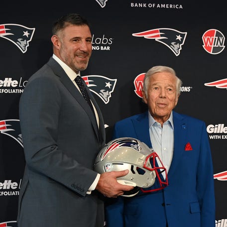 Mike Vrabel poses with New England Patriots owner Robert Kraft after a press conference at Gillette Stadium to introduce Vrabel as the Patriots' new head coach on Jan. 13, 2025.