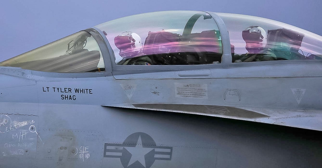 Pilots prepare to take off at on the Aircraft Carrier as our photographer Nadia Zomorodian spent 24 hours at sea.