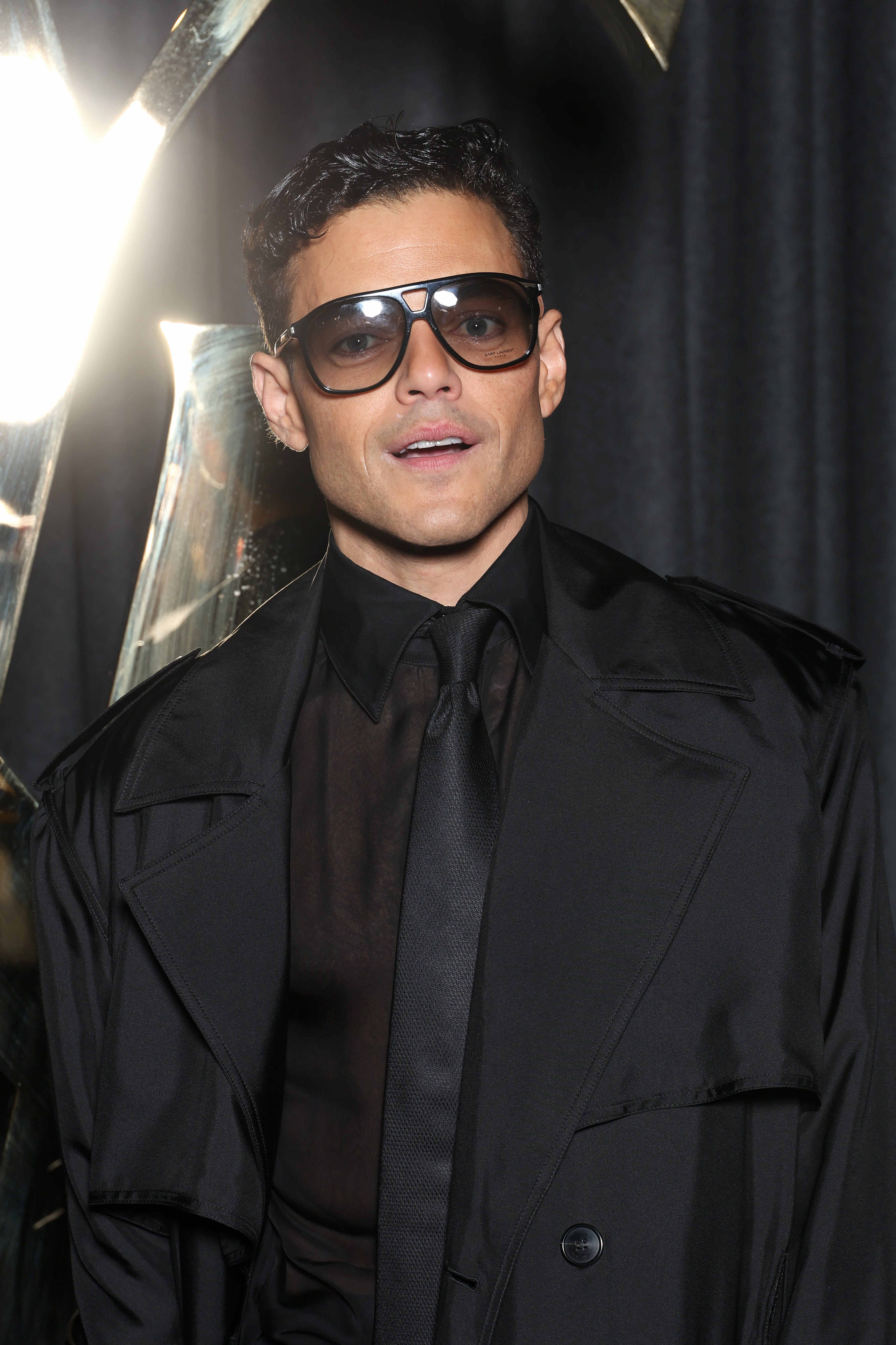 PARIS, FRANCE - SEPTEMBER 24: (EDITORIAL USE ONLY - For Non-Editorial use please seek approval from Fashion House) Rami Malek attends the Saint Laurent Womenswear Spring-Summer 2025 show as part of Paris Fashion Week on September 24, 2024 in Paris, France. (Photo by Pascal Le Segretain/Getty Images)