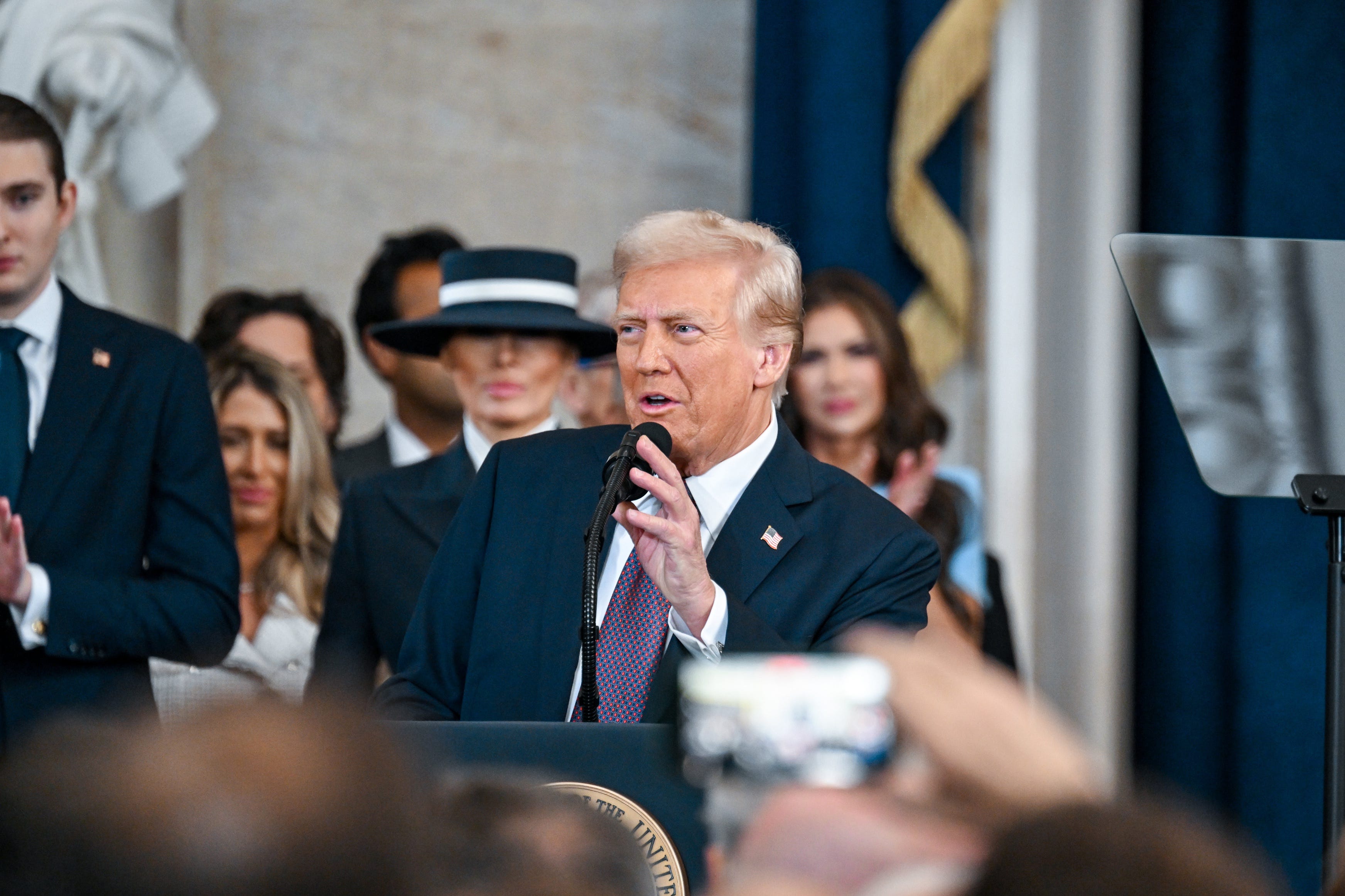 Jan 20, 2025; Washington, DC, USA; President-elect Donald J. Trump speaks after being sworn in during the ceremony for the inauguration of Donald Trump as the 47th president of the United States takes place inside the Capitol Rotunda of the U.S. Capitol building in Washington, D.C., Monday, January 20, 2025. It is the 60th U.S. presidential inauguration and the second non-consecutive inauguration of Trump as U.S. president. Mandatory Credit:   Kenny Holston-Pool via Imagn Images