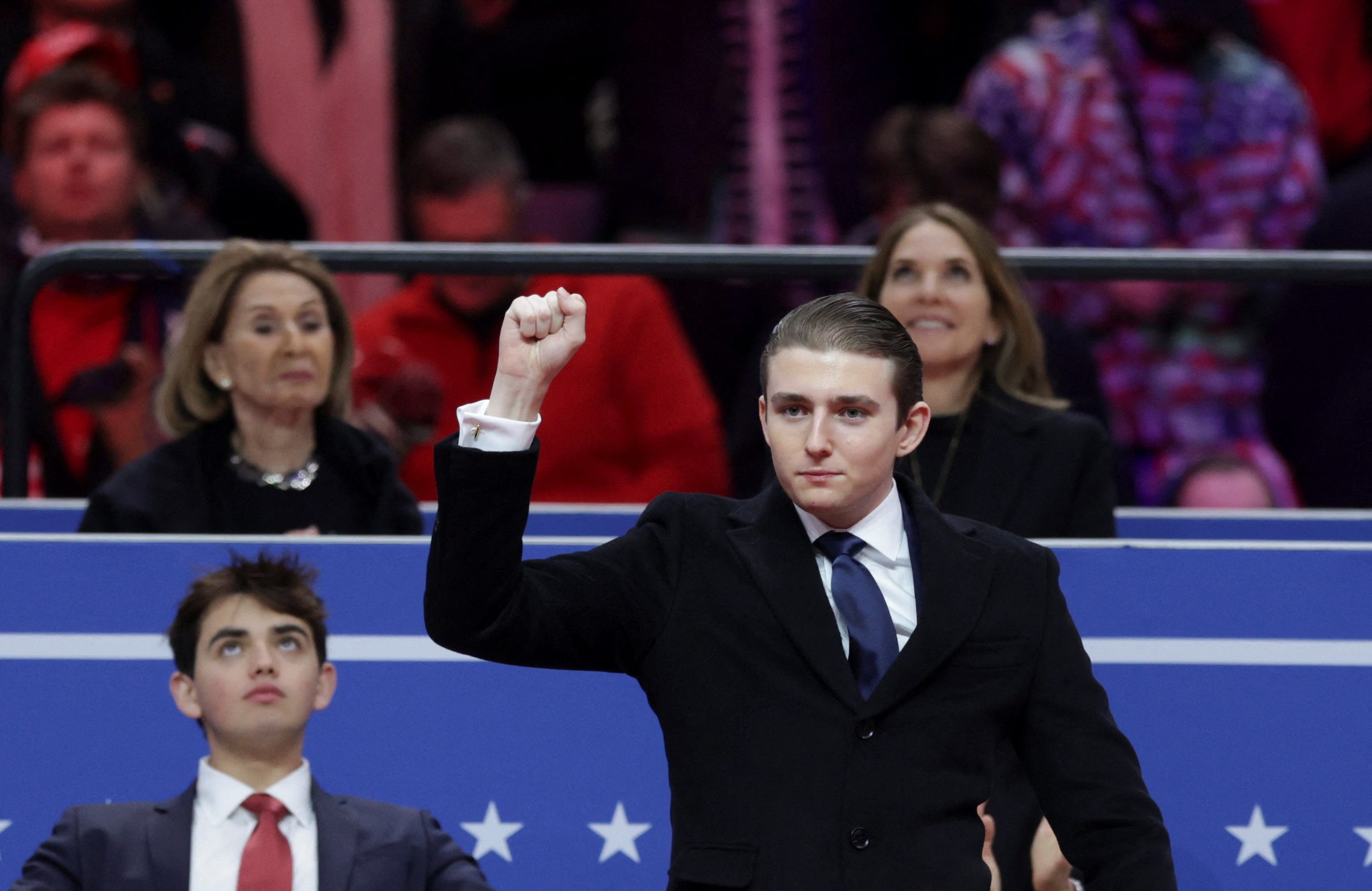Barron Trump gestures during a rally on the inauguration day of U.S. President Donald Trump's second Presidential term, inside Capital One, in Washington, U.S. January 20, 2025.