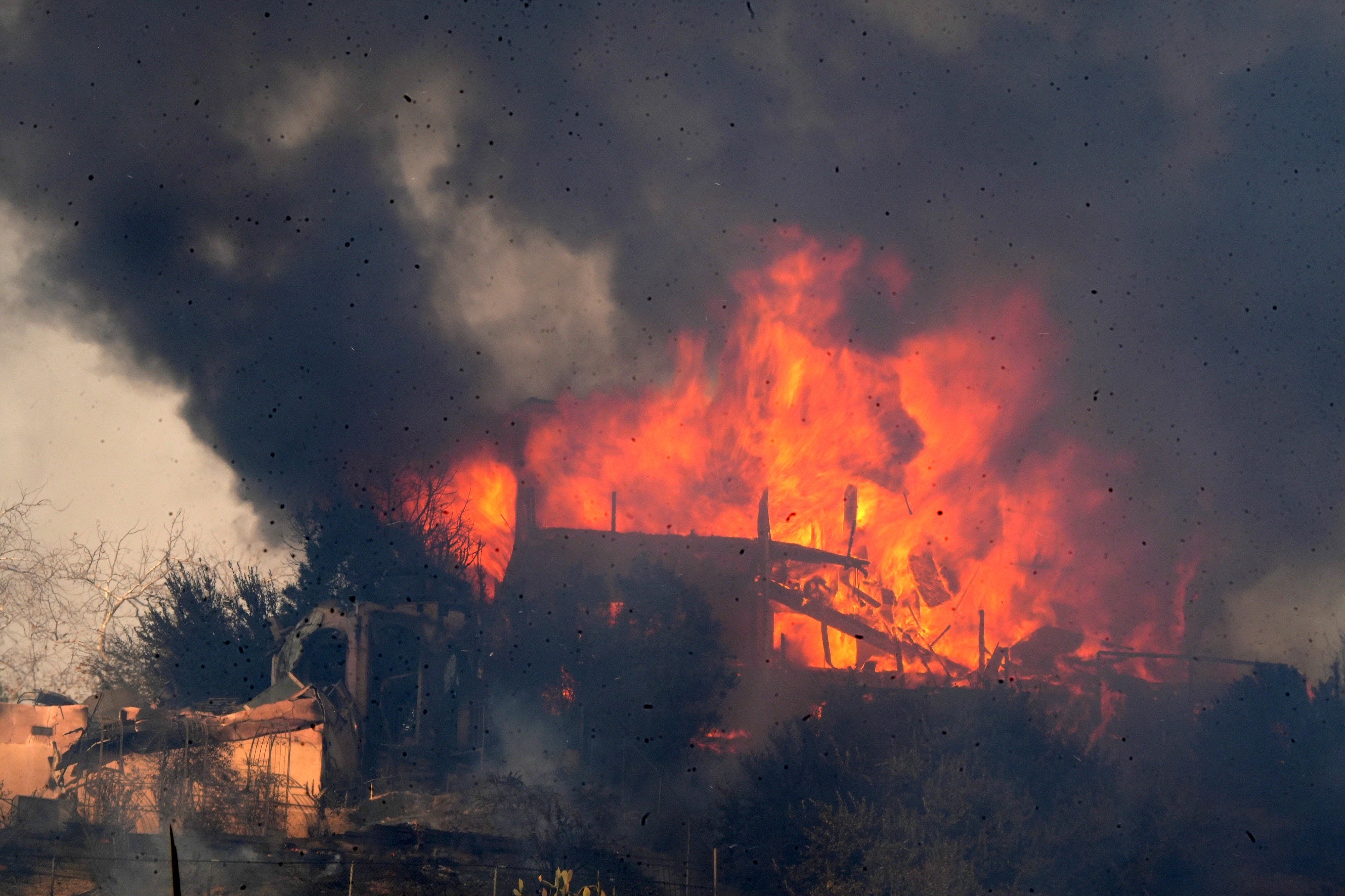 A house on top of a hill along Pacific Coast Highway in Malibu was fully engulfed in flames from the Palisades Fire on Wednesday, Jan. 8, 2025. The fire erupted a day earlier amid fierce Santa Ana winds.