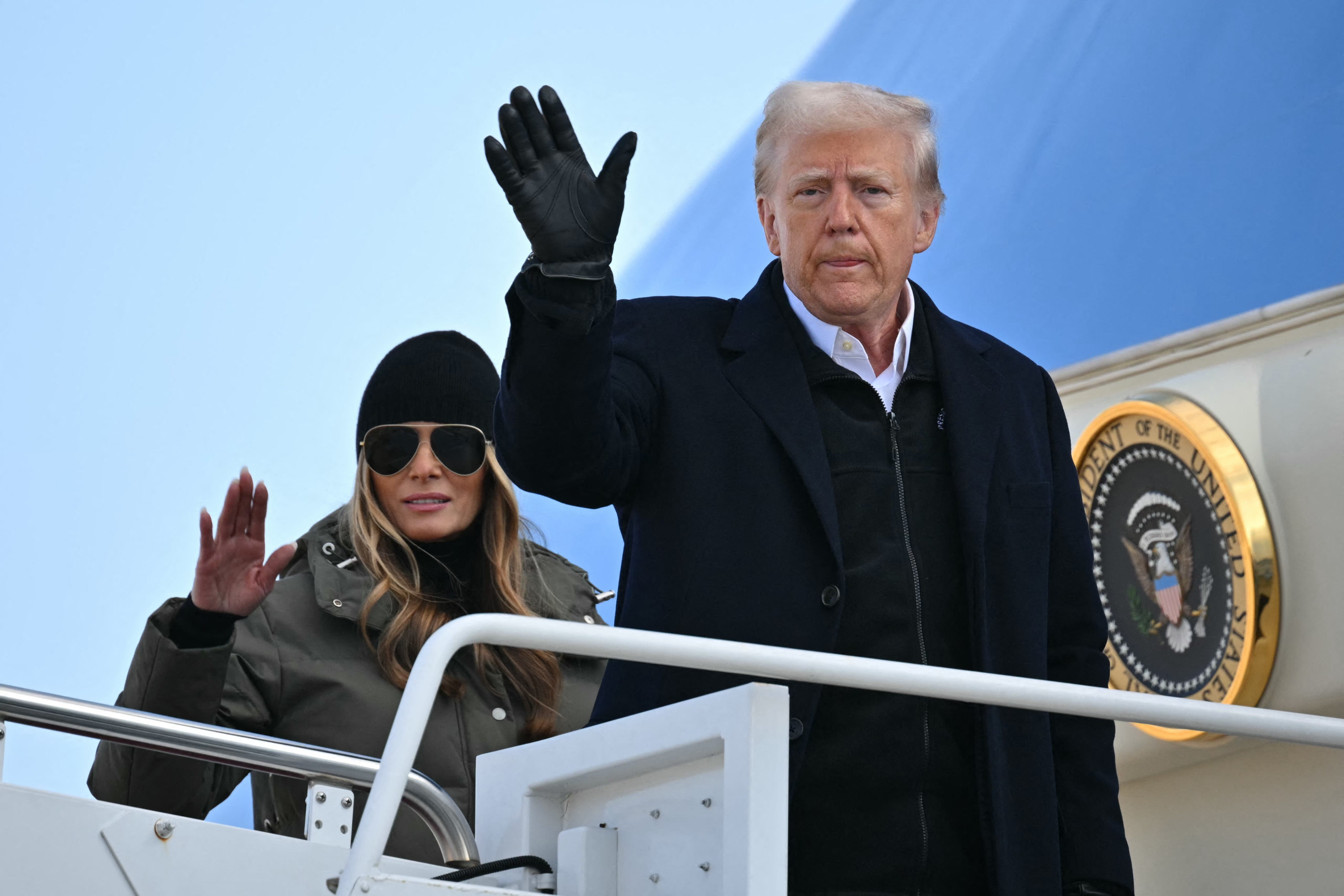 President Donald Trump and first lady Melania Trump board Air Force One at Joint Base Andrews in Maryland on Jan. 24, 2025, to check on hurricane damage in Asheville, N.C.