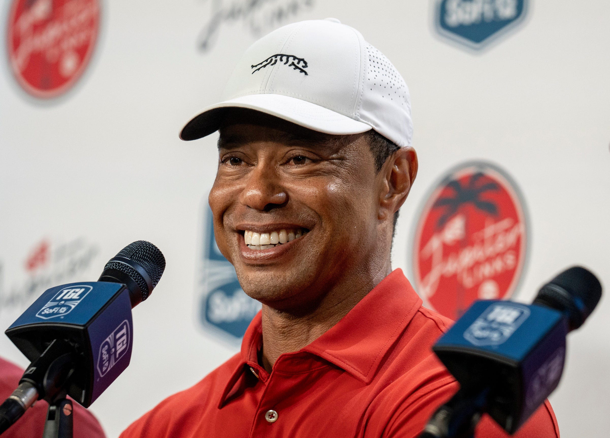 Golfer Tiger Woods smiles during a press conference after play at SoFi Center for golf match between Jupiter Links Golf Club and Los Angeles Golf Club in the TGL, the interactive golf league founded by Woods and Rory McIlroy on January 14, 2025.