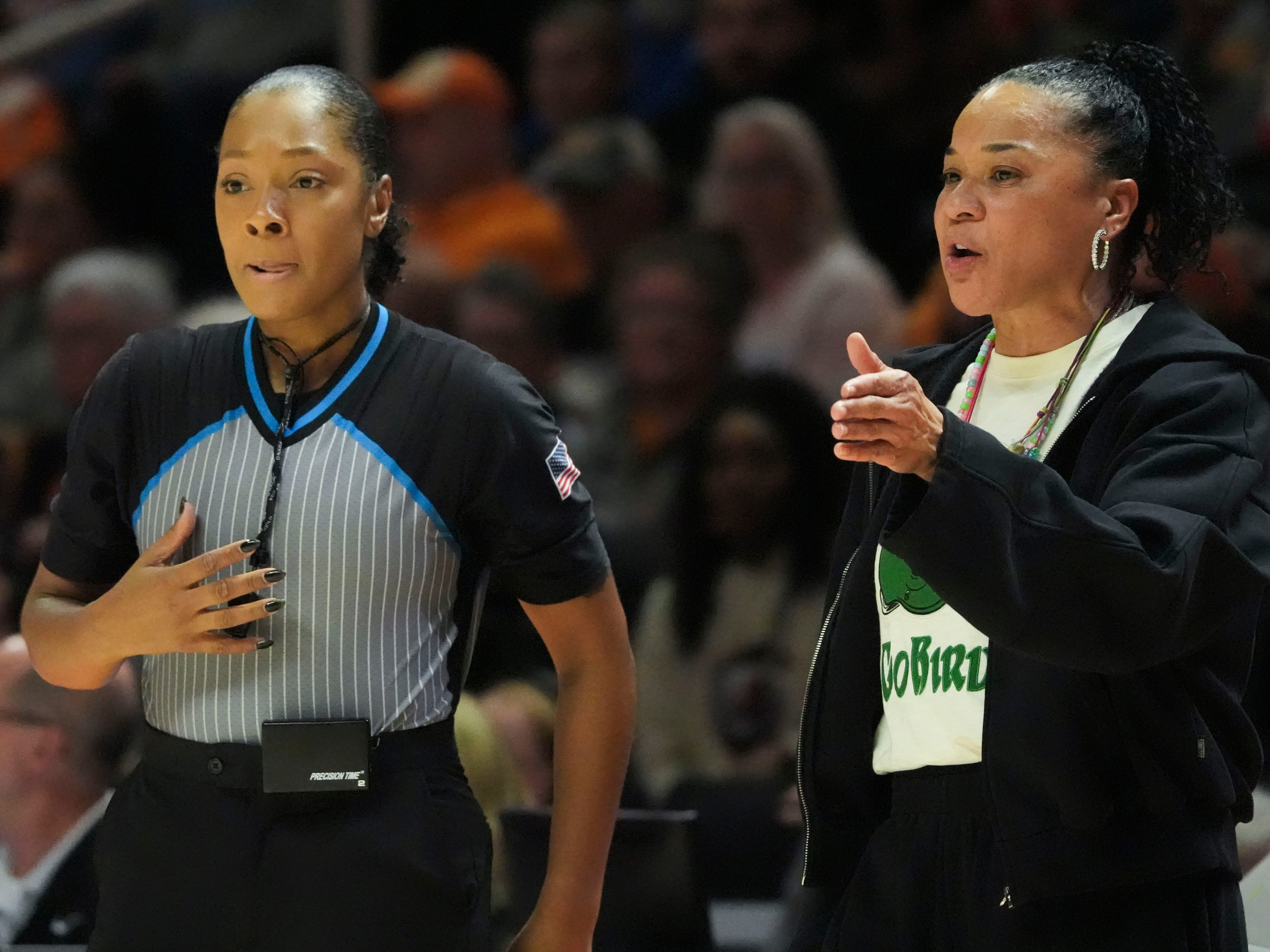 South Carolina basketball coach Dawn Staley talks with an official during the NCAA college basketball game against Tennessee on Monday, Jan. 27, 2025, in Knoxville, Tenn.