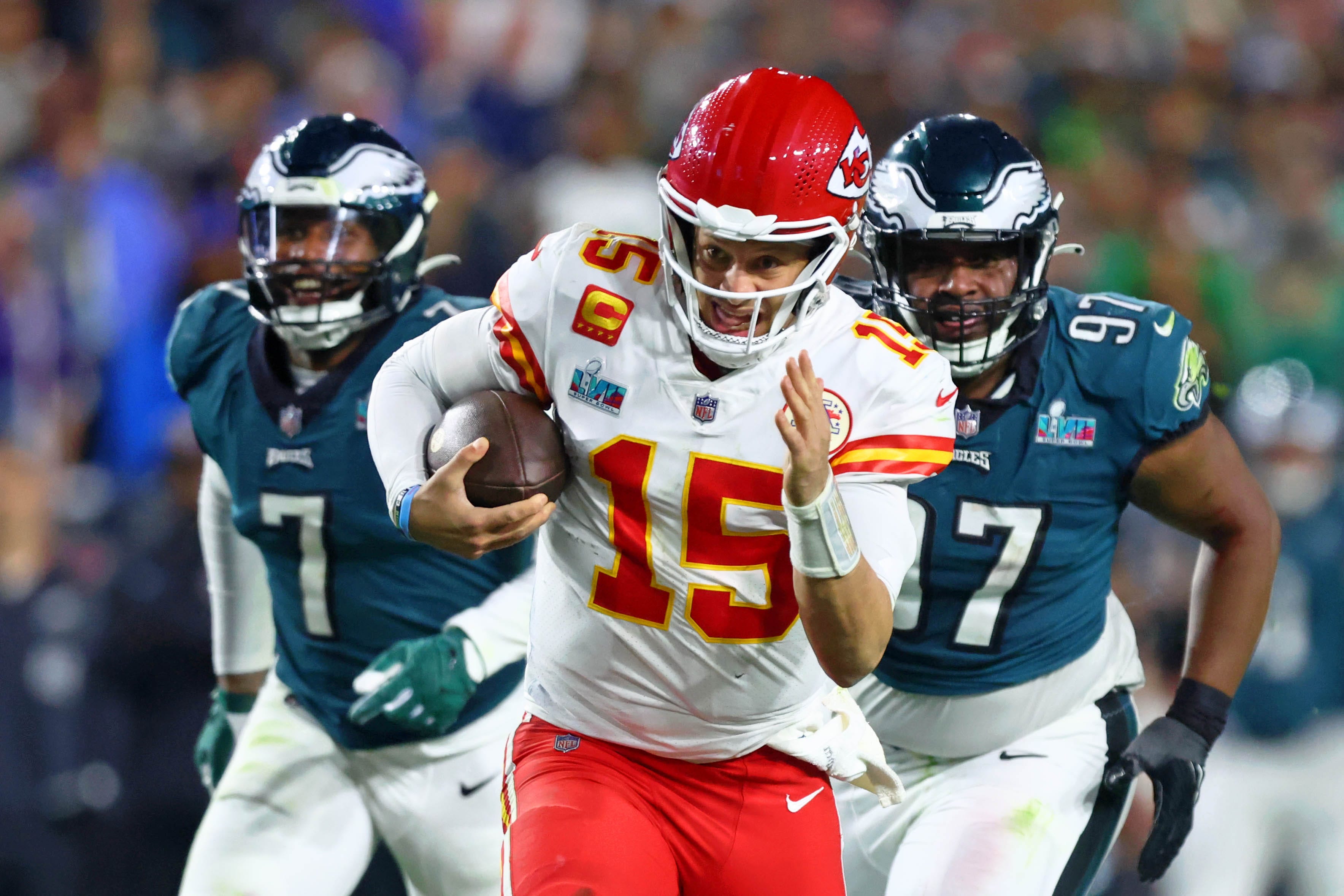 Feb 12, 2023; Glendale, Arizona, US; Kansas City Chiefs quarterback Patrick Mahomes (15) runs with the ball against the Philadelphia Eagles during the fourth quarter of Super Bowl LVII at State Farm Stadium. Mandatory Credit: Mark J. Rebilas-USA TODAY Sports