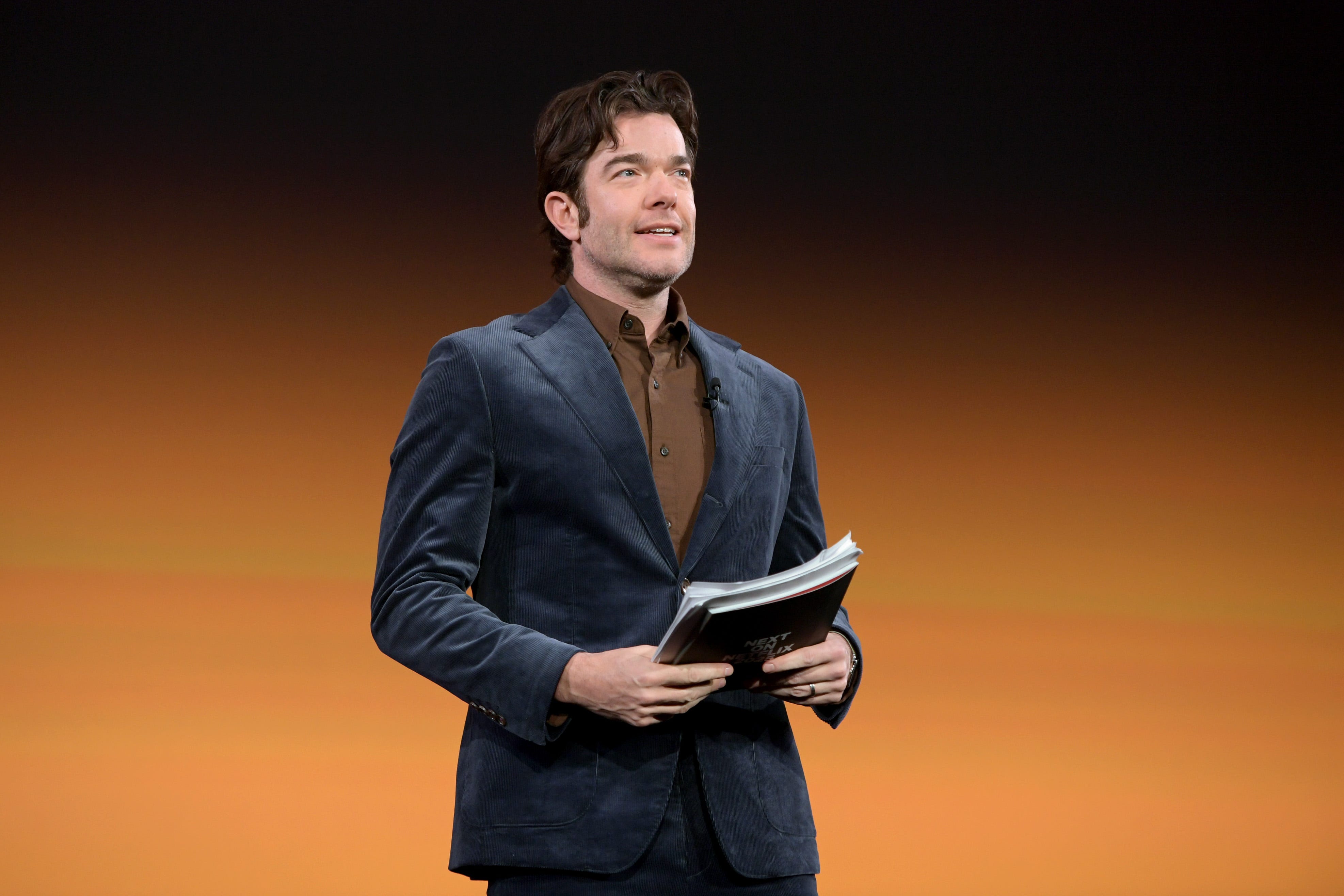 John Mulaney speaks onstage during Netflix's Next On Netflix presentation in Los Angeles on Jan. 29, 2025.