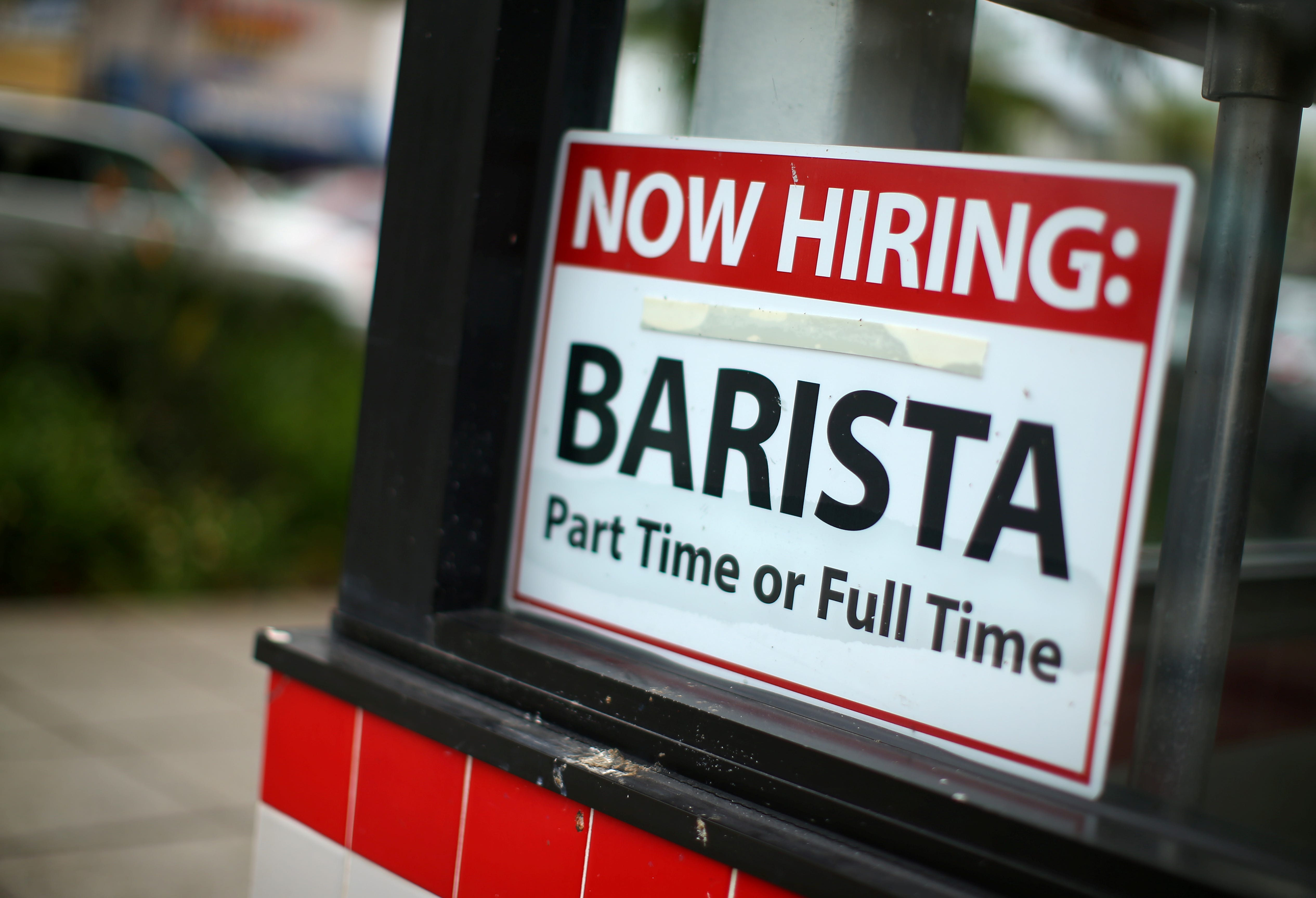 A restaurant advertises for a worker in Encinitas, California. Low-paid workers' have seen faster wage growth since the pandemic but that advantage has vanished over the past year or so.