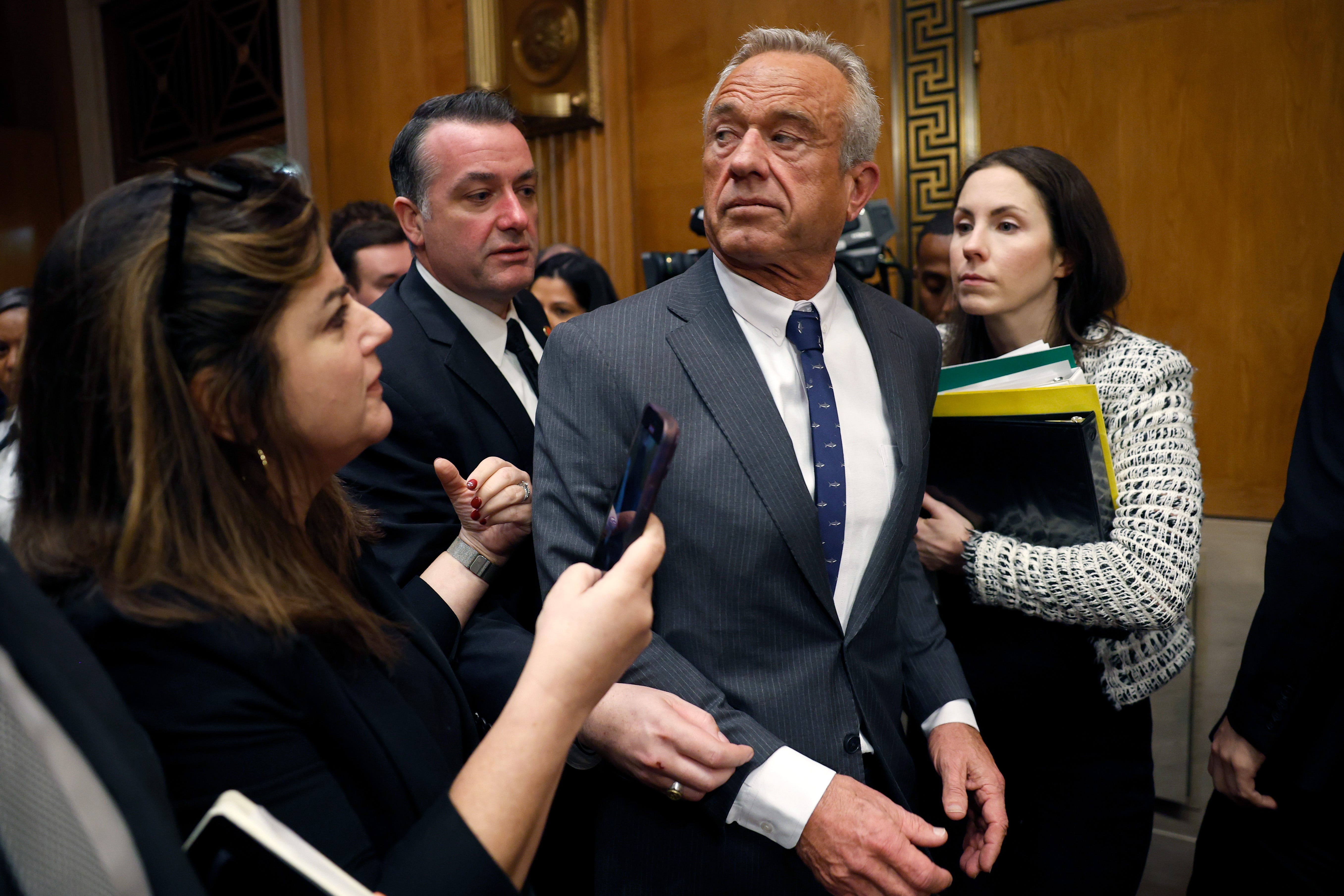 Robert F. Kennedy Jr., President Donald Trump's nominee for secretary of Health and Human Services, departs his Senate confirmation hearing on Jan. 30, 2025.