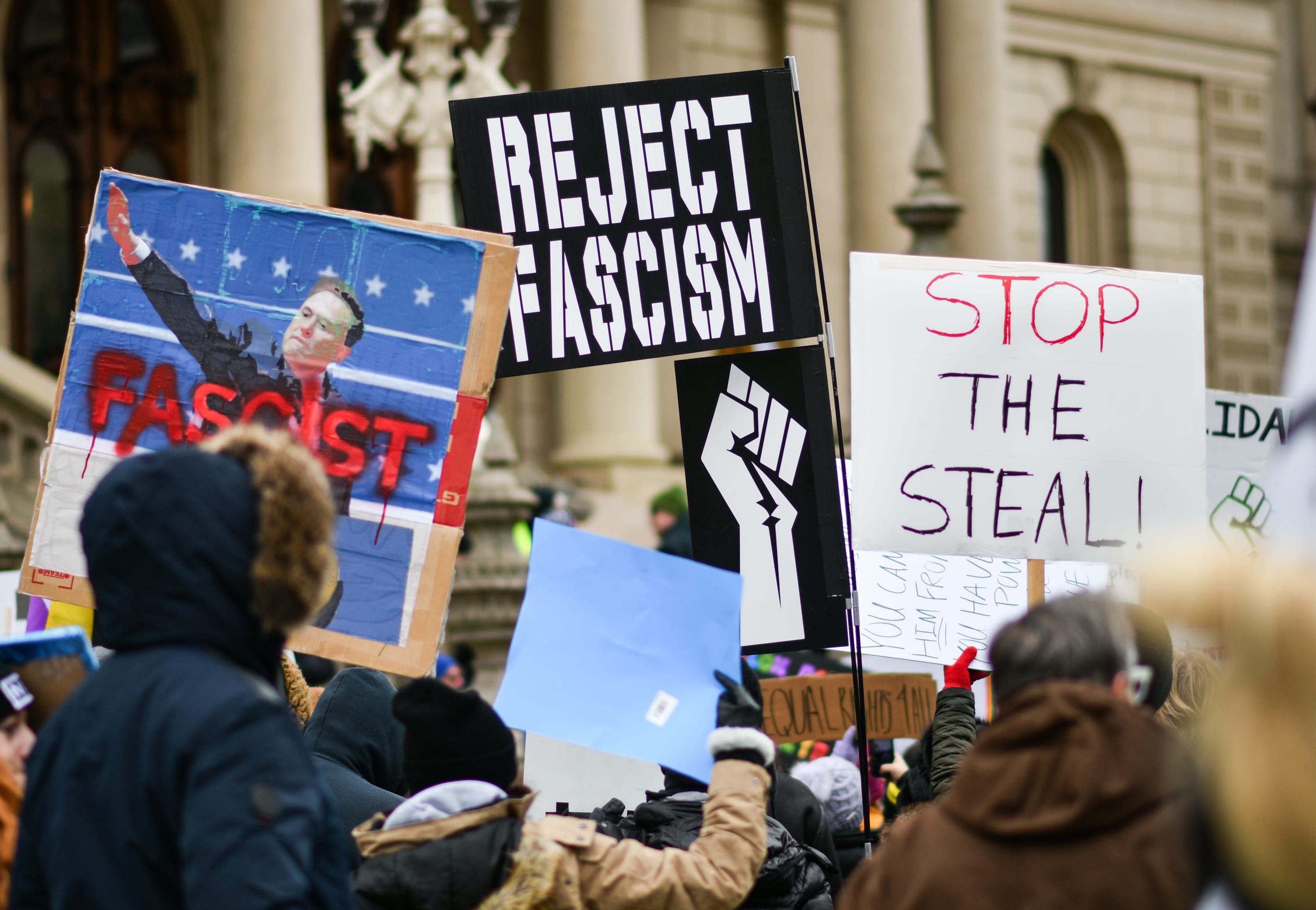 Several hundred demonstrators rally at the Michigan Capitol in Lansing on Feb. 5, 2025.