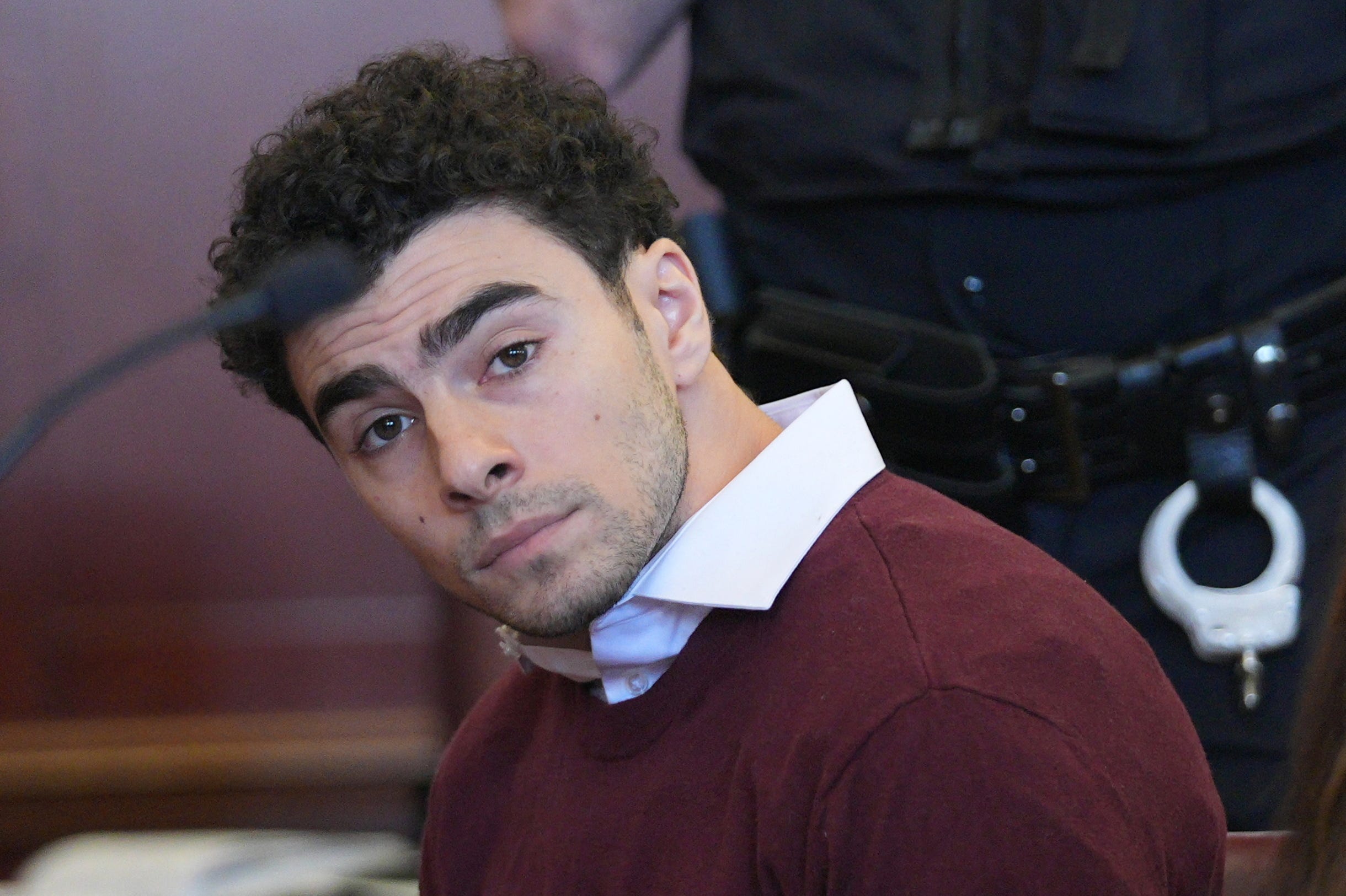 Luigi Mangione, the suspect in the killing of UnitedHealth Group CEO Brian Thompson, appears in Manhattan Supreme Court for his arraignment hearing in New York City on Dec. 23, 2024.