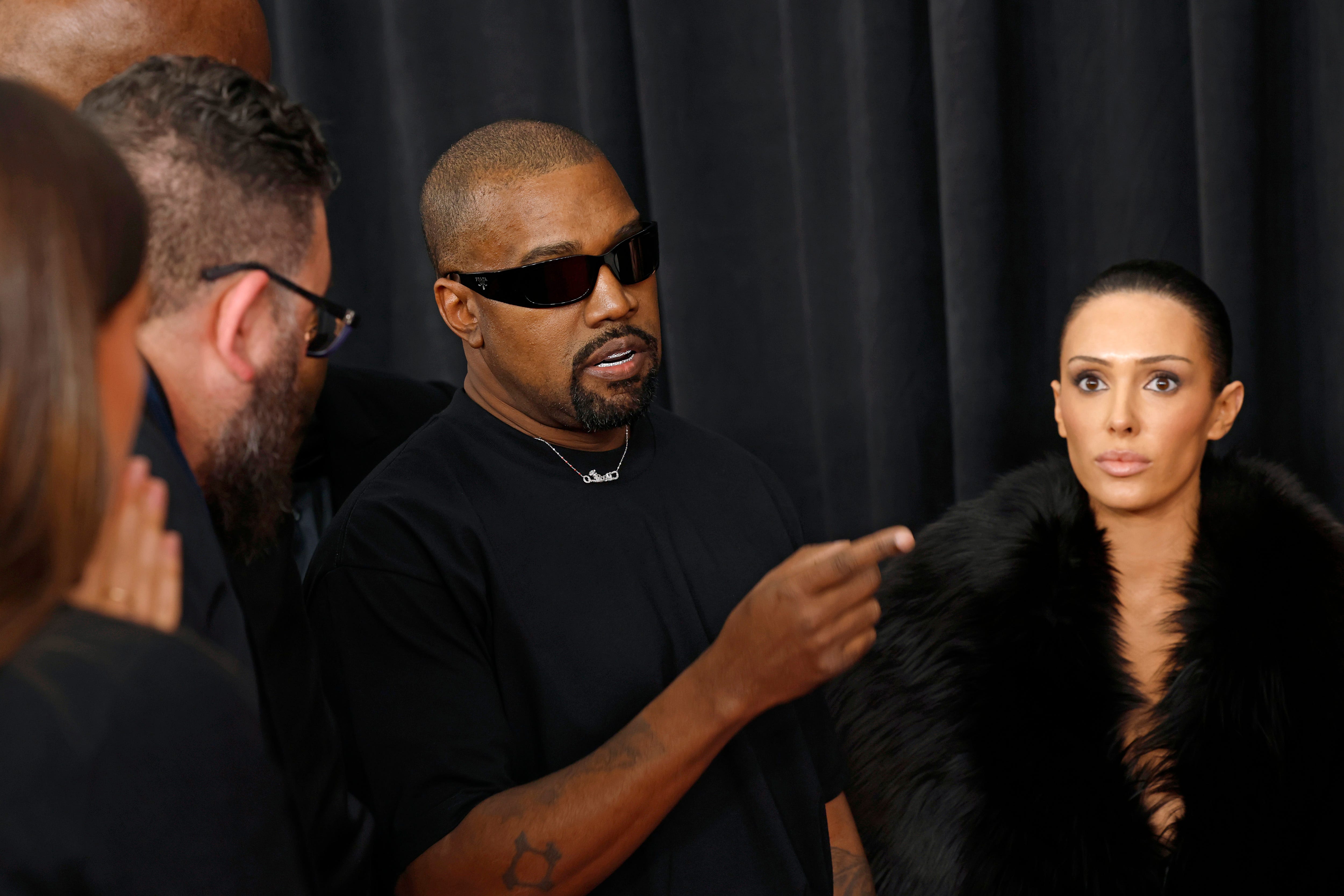 Kanye West, left, and Bianca Censori attend the Grammy Awards on Feb. 2, 2025, in Los Angeles.