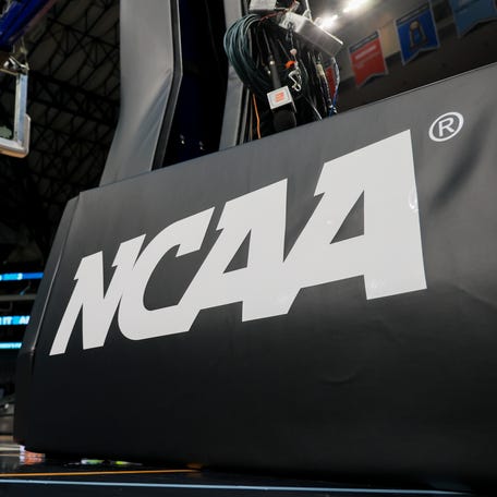 Mar 29, 2023; Dallas, TX, USA; The NCAA logo on the stanchion is seen at the American Airlines Center prior to practice. Mandatory Credit: Aaron Doster-USA TODAY Sports
