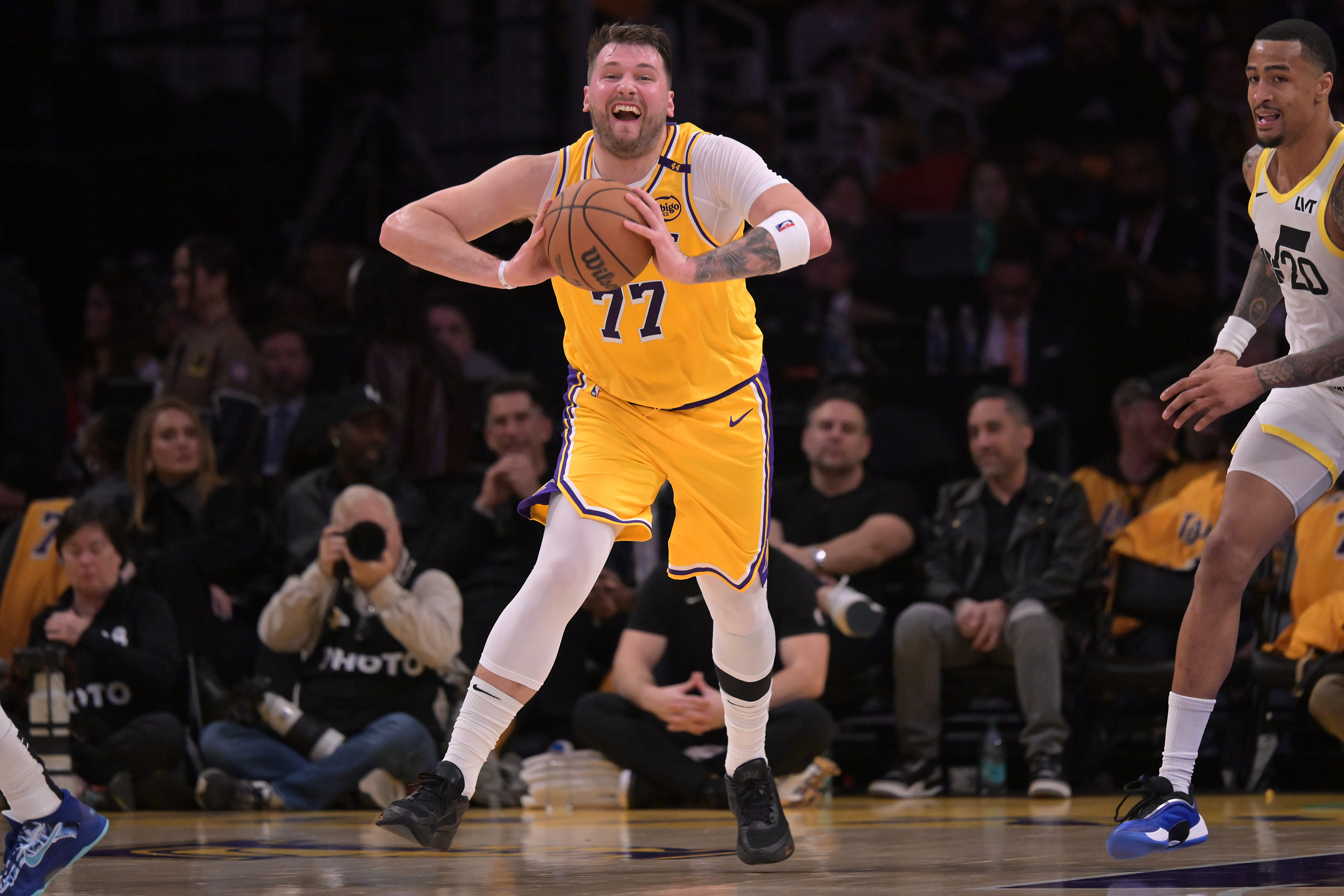 Los Angeles Lakers guard Luka Doncic (77) looks to make a long pass down court during Monday's game against the Utah Jazz at Crypto.com Arena.