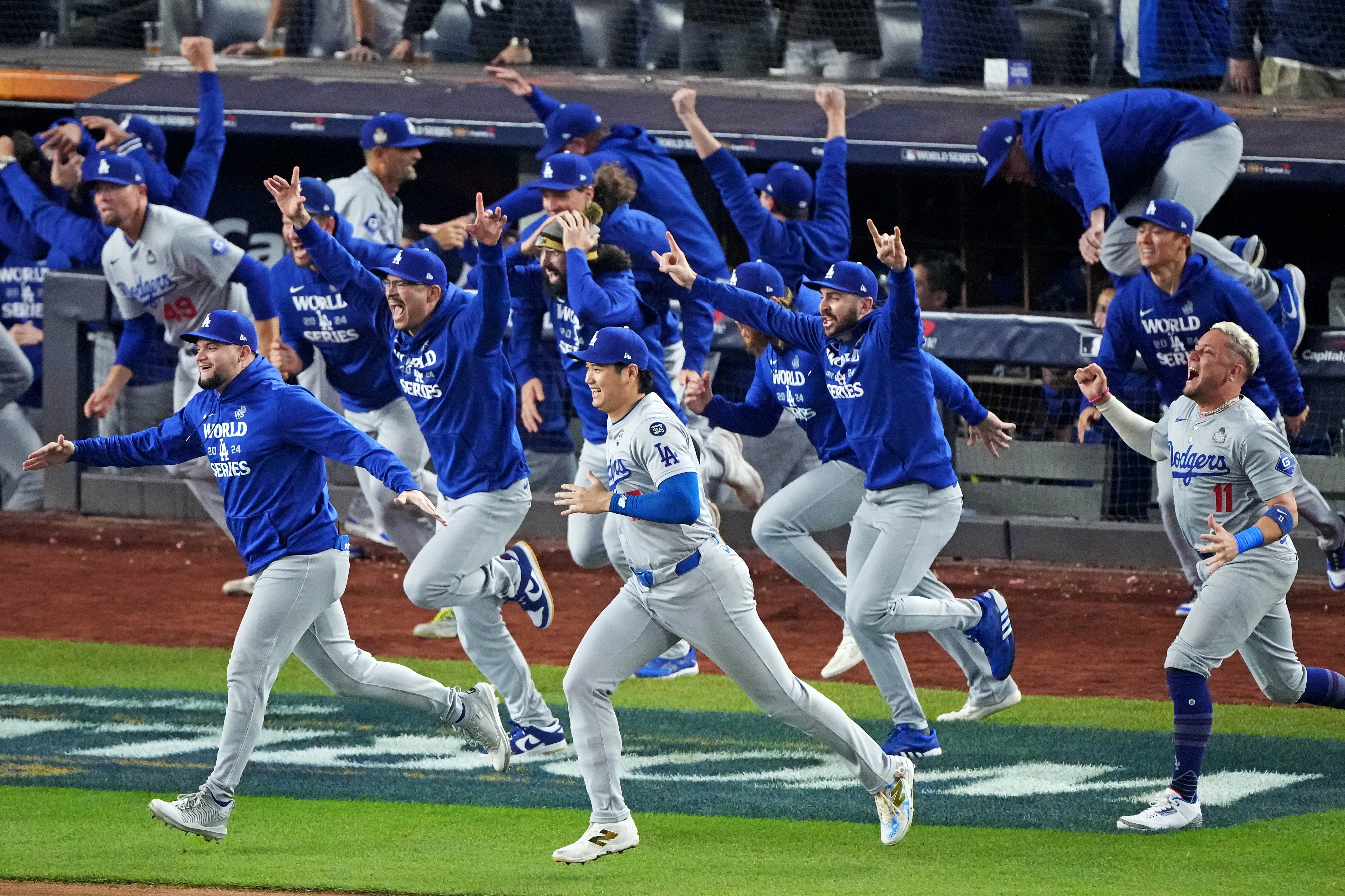 The Dodgers celebrate after beating the Yankees in the 2024 World Series at Yankee Stadium.